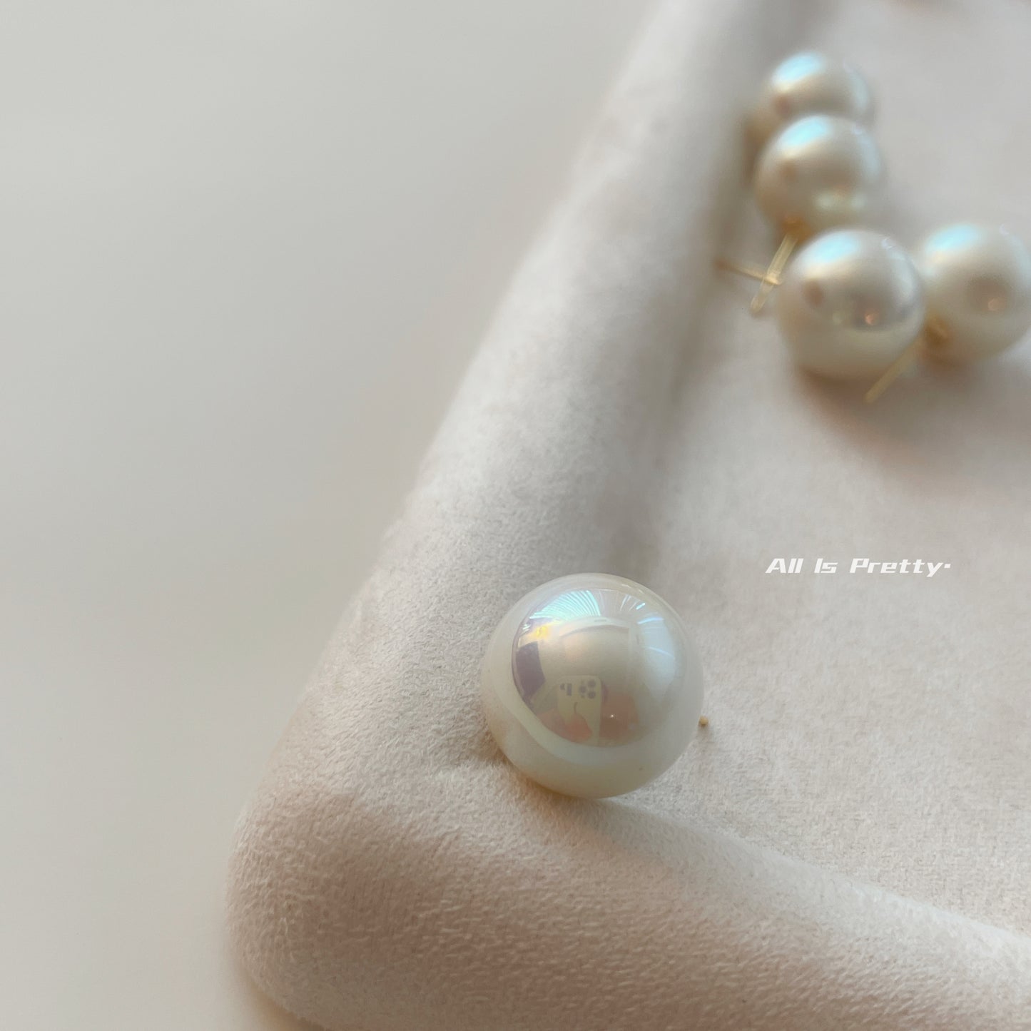 Glow Japanese faux pearl studded earrings