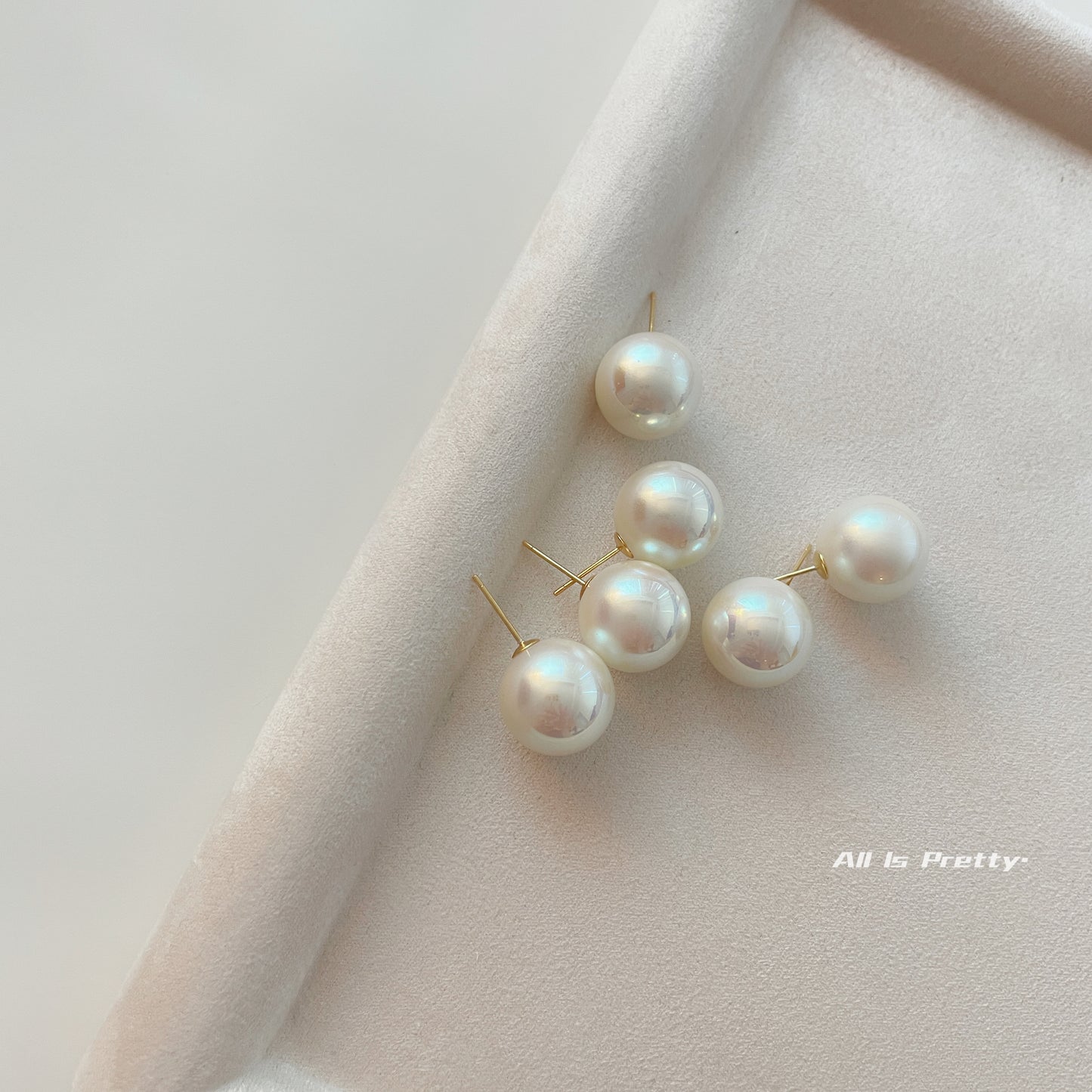 Glow Japanese faux pearl studded earrings
