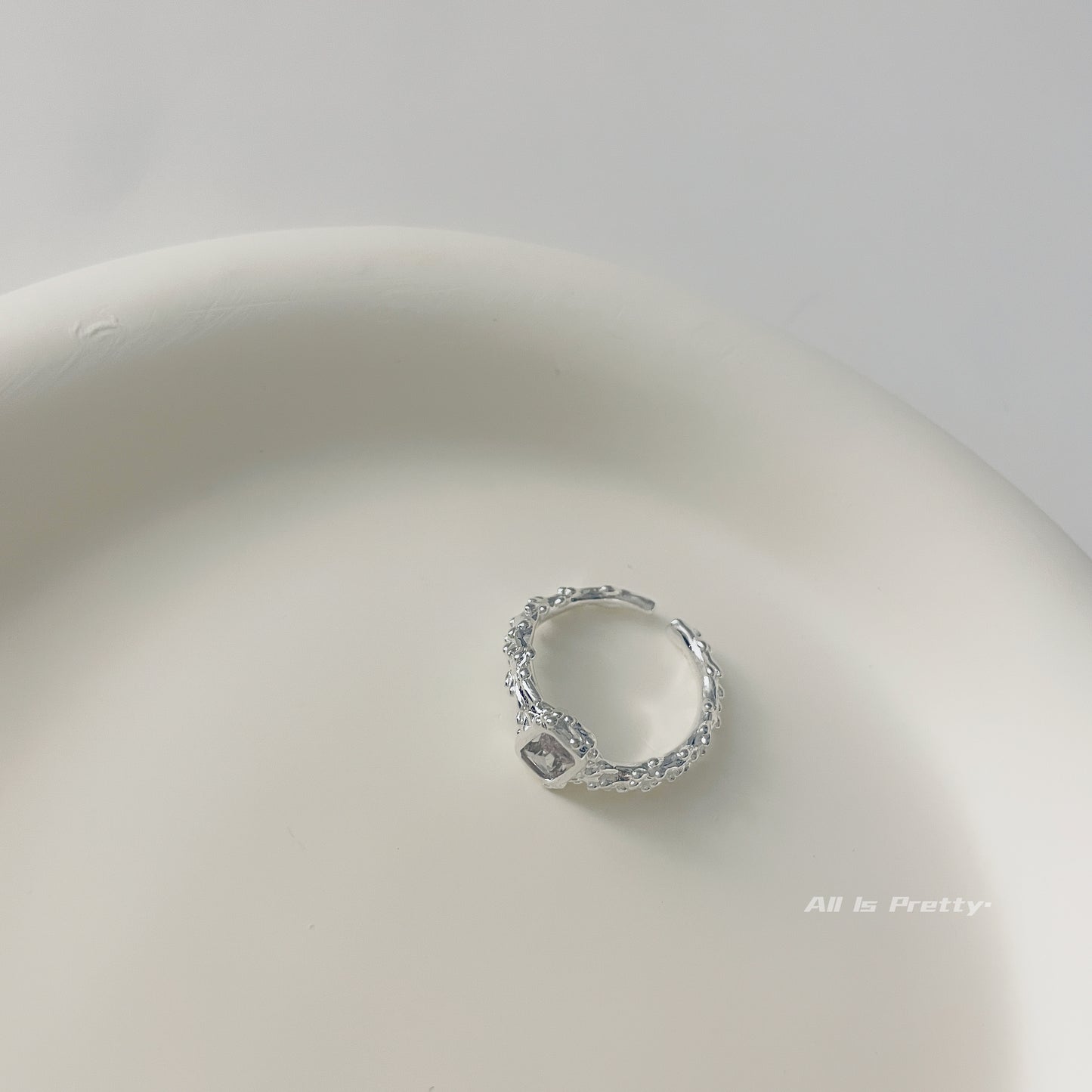 Ice textured open ring