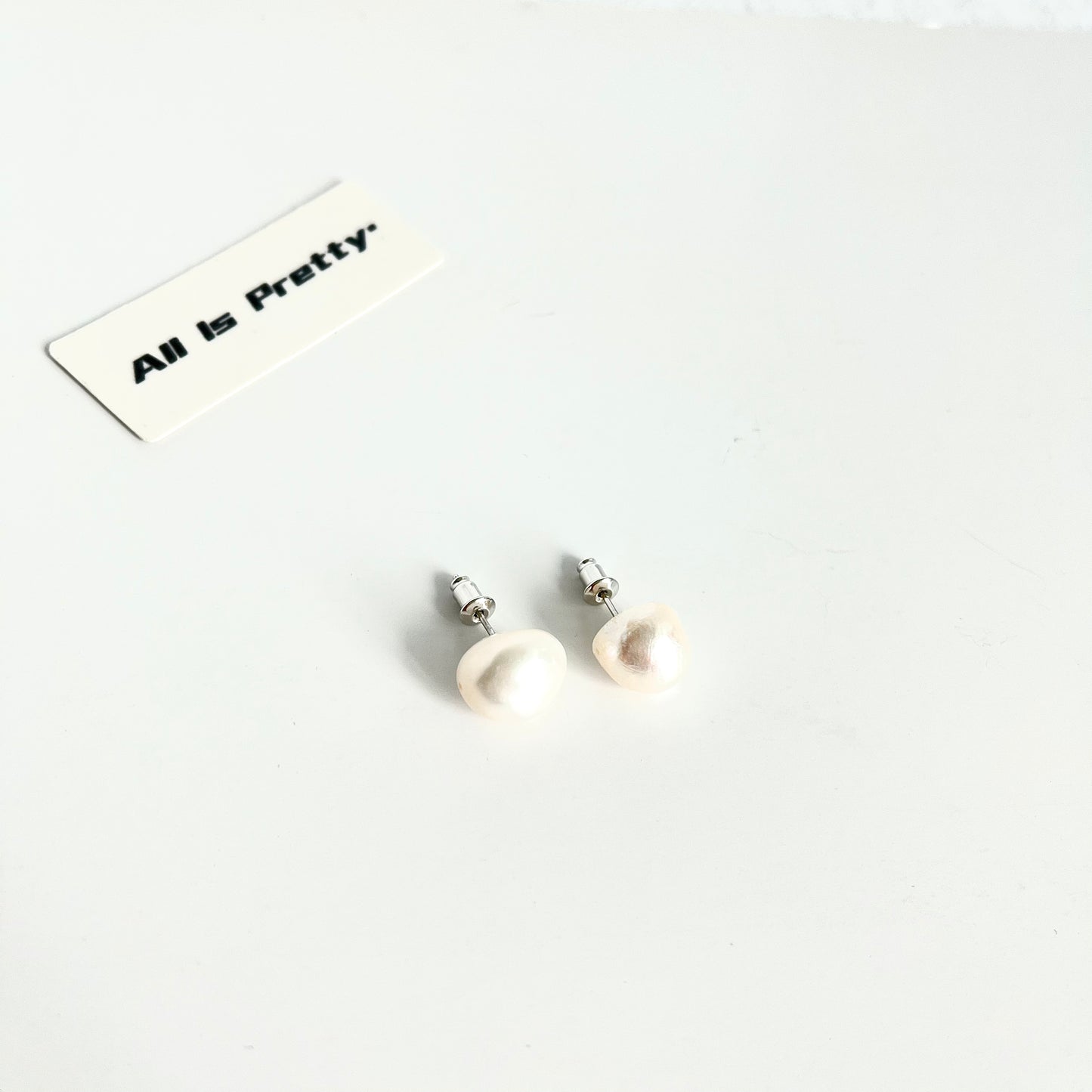 Baroque off round pearls studded earrings