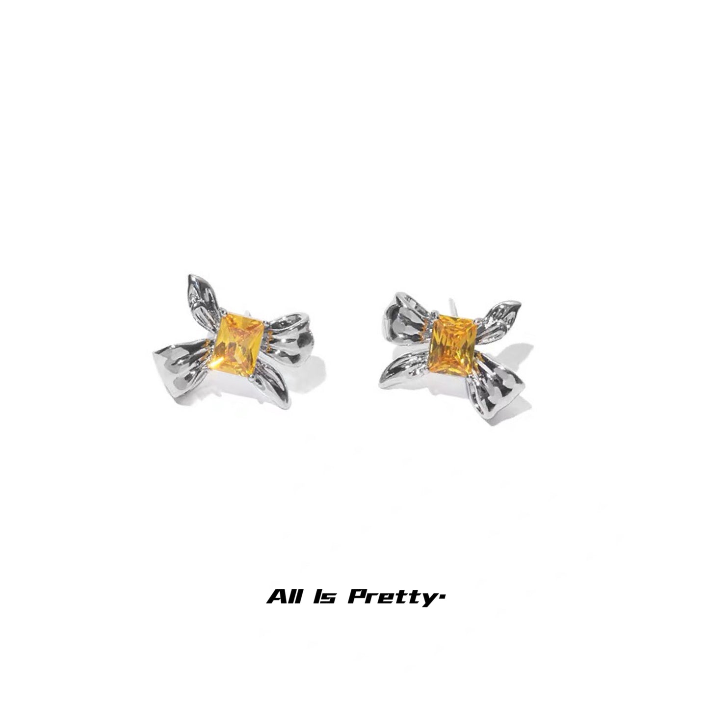Yellow crystal bow stud earrings