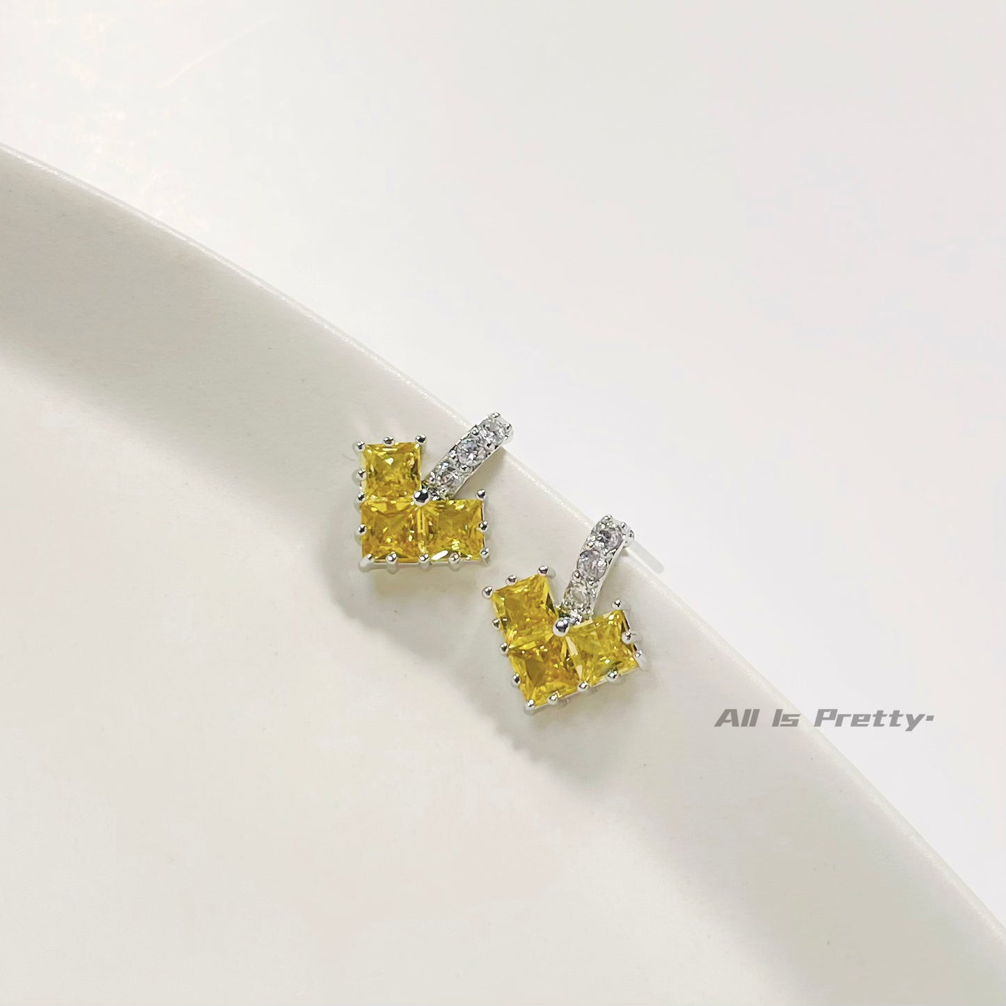 Geometric yellow crystal earrings