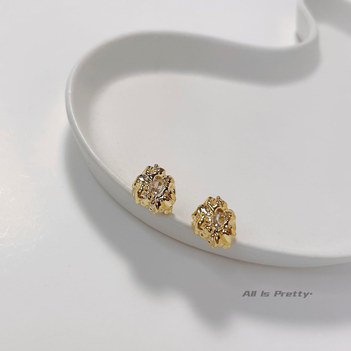 Gold stone studded earrings