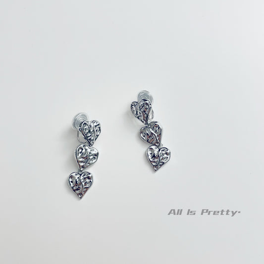 Textured hearts clip-on earrings