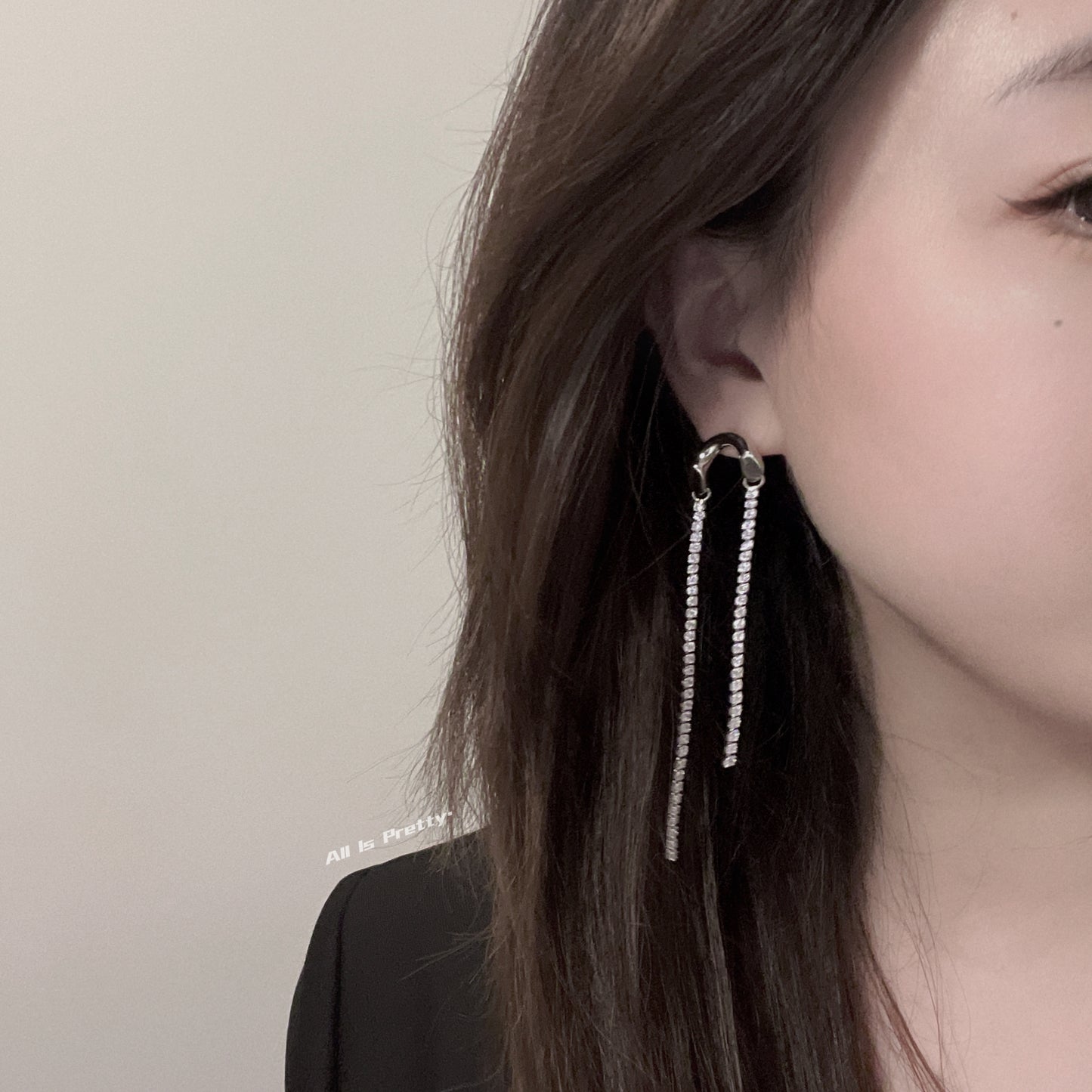 Asymmetric tassel zirconia earrings