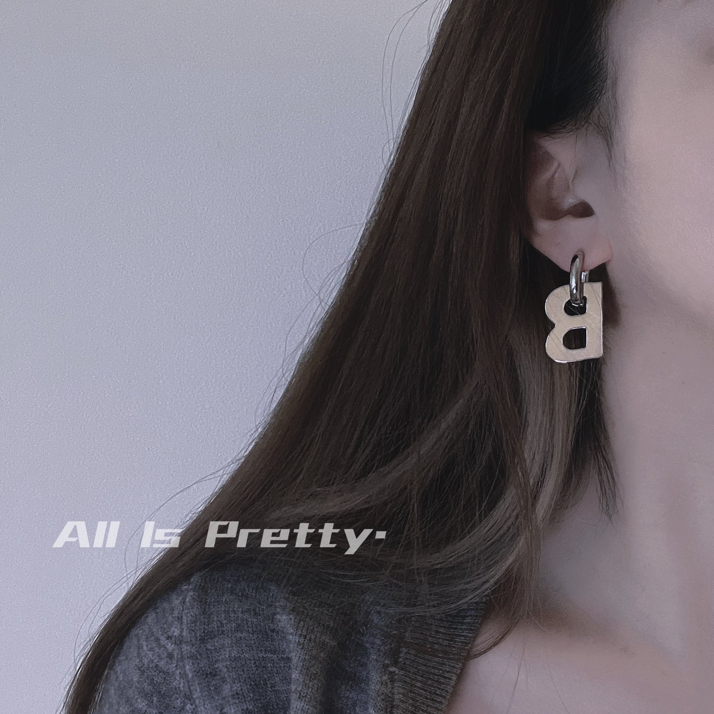 “B” earrings