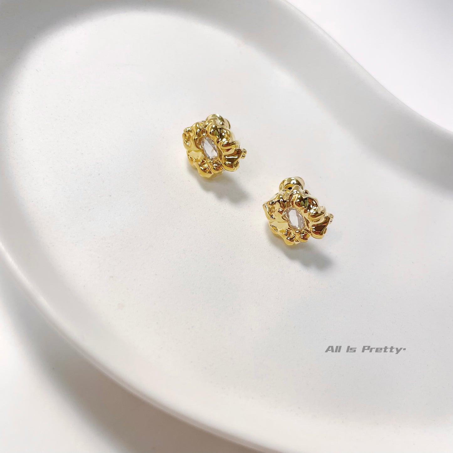 Gold stone studded earrings