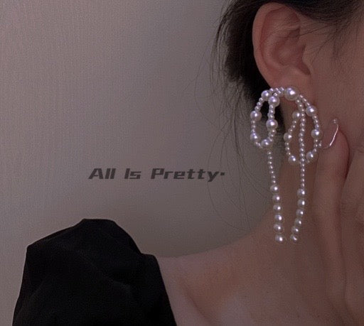 Large pearl bow earrings