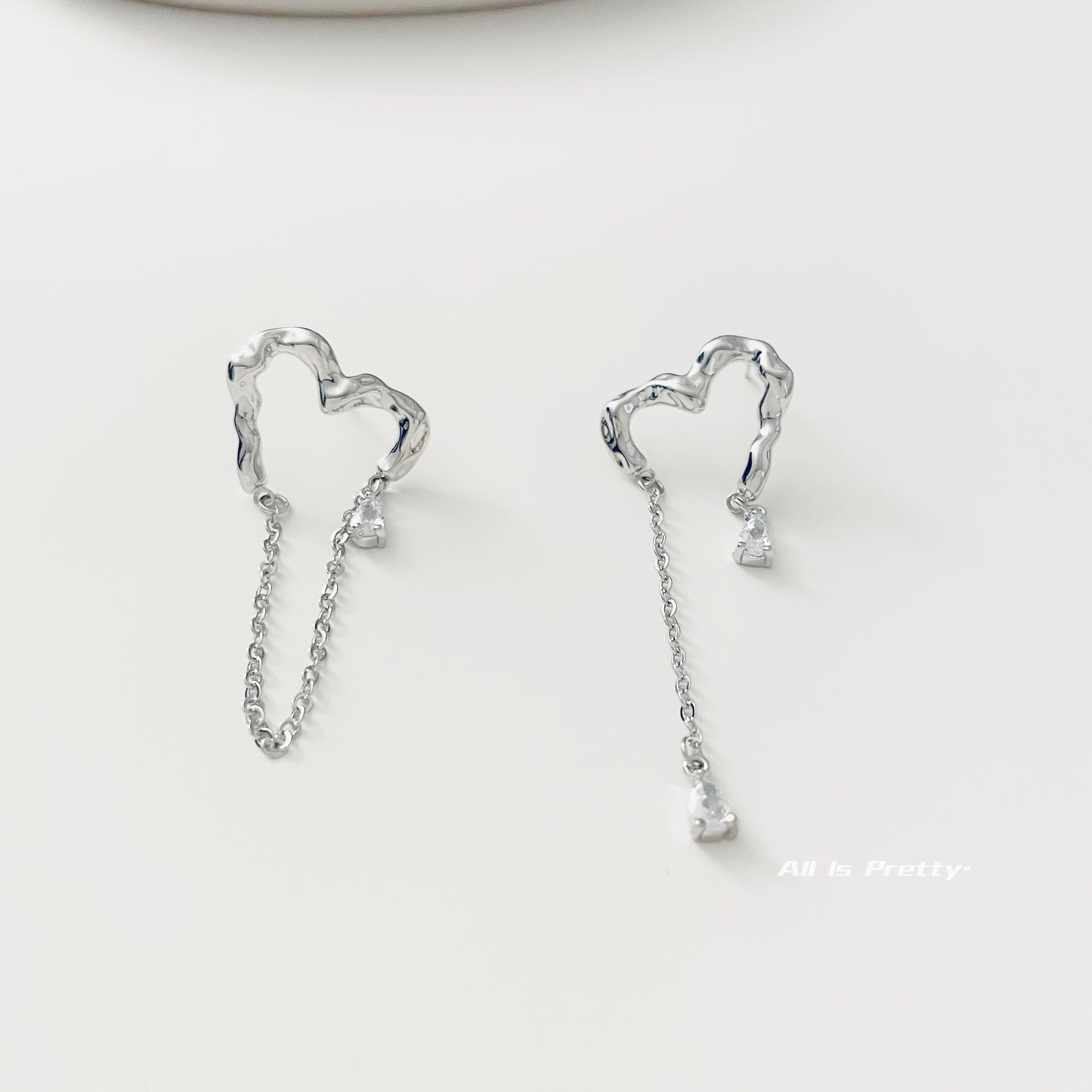 Unbalanced love stud earrings