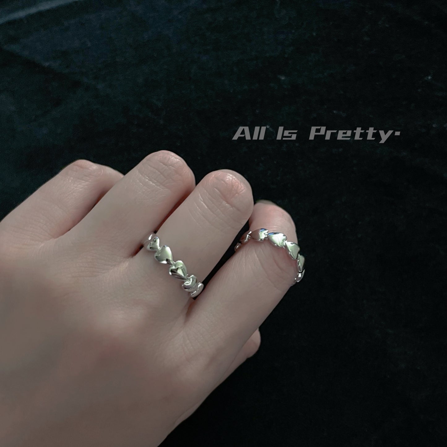 Tiny heart shaped silver ring