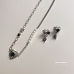 Heart black rose studded earrings