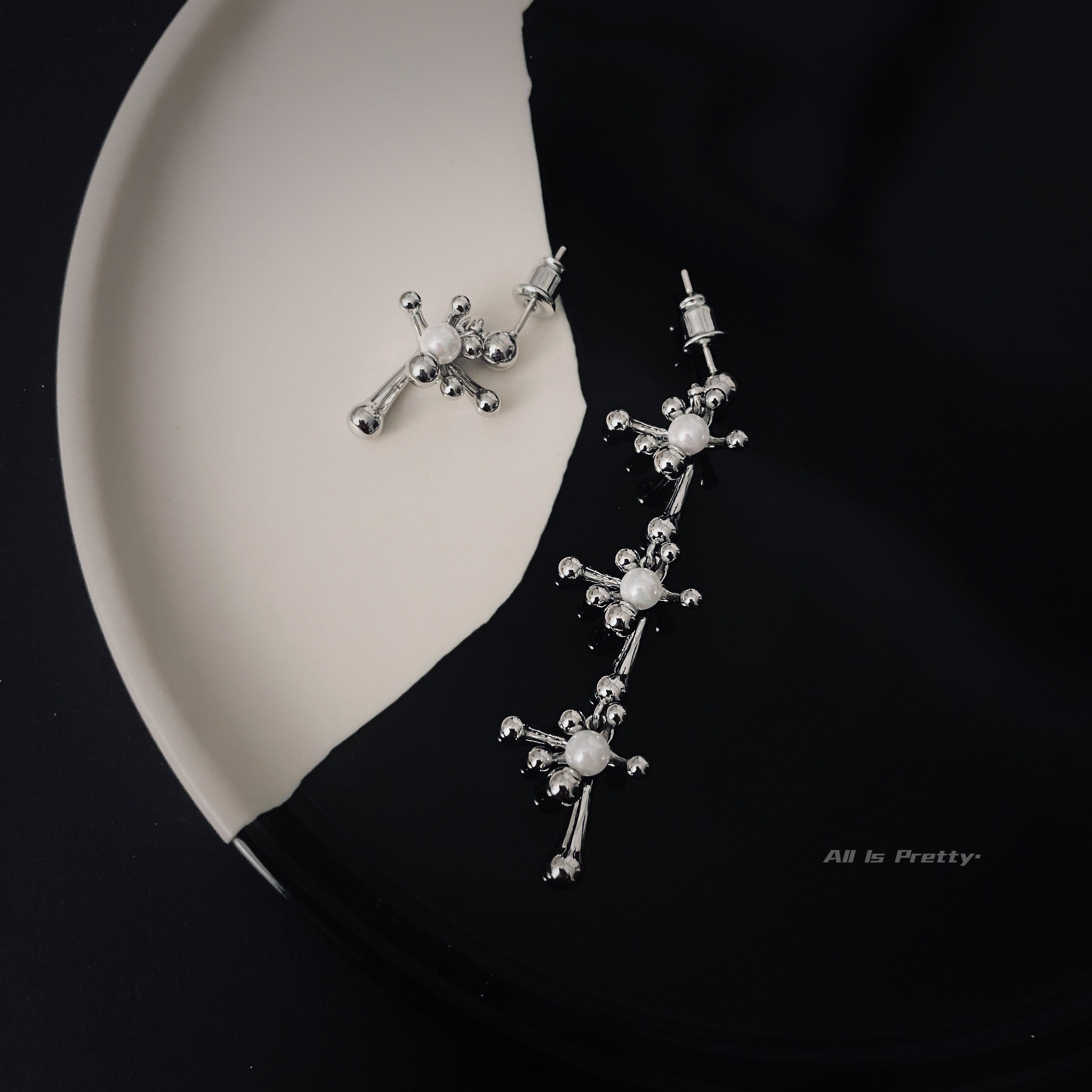 Snowflake unbalanced earrings