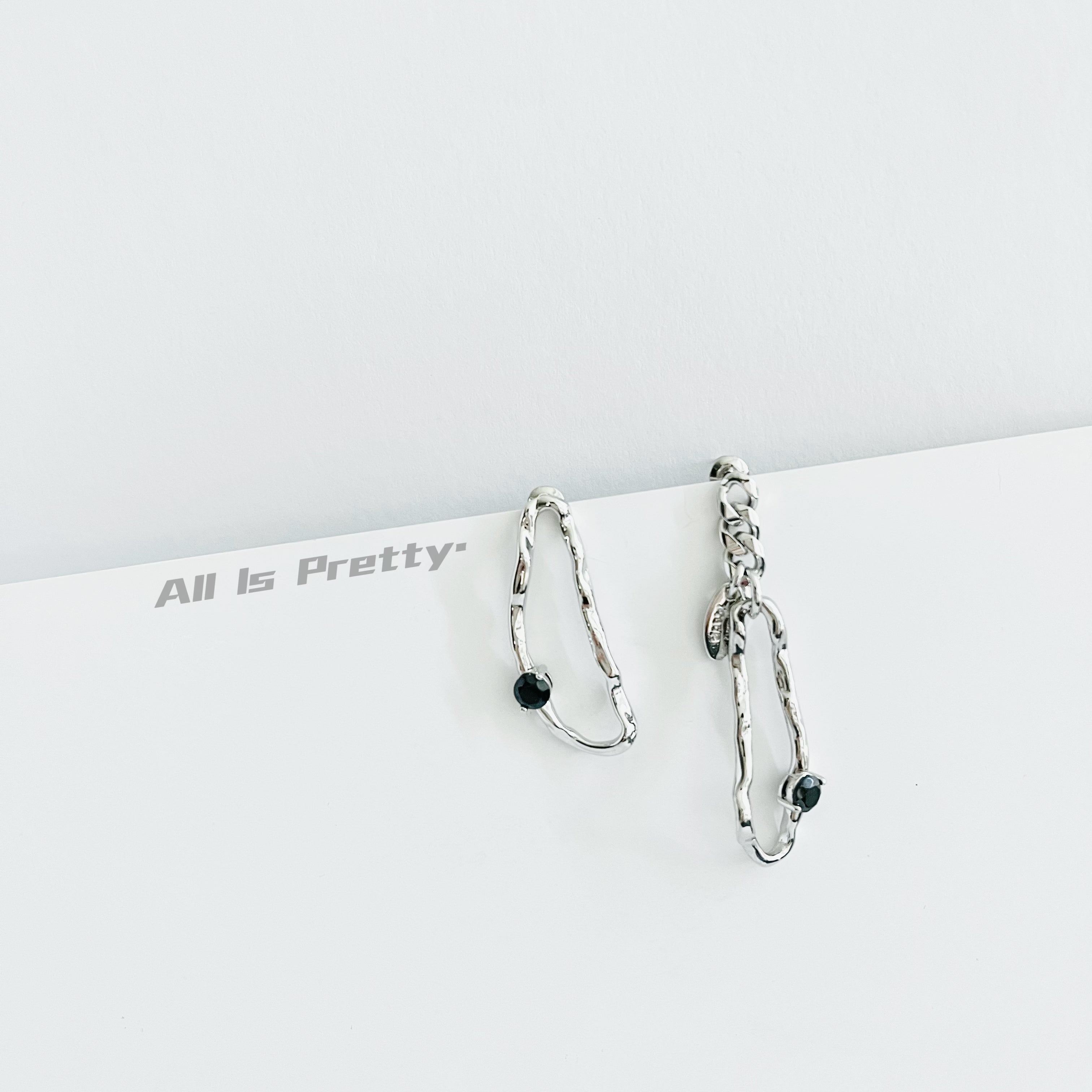 Unbalanced stylish earrings