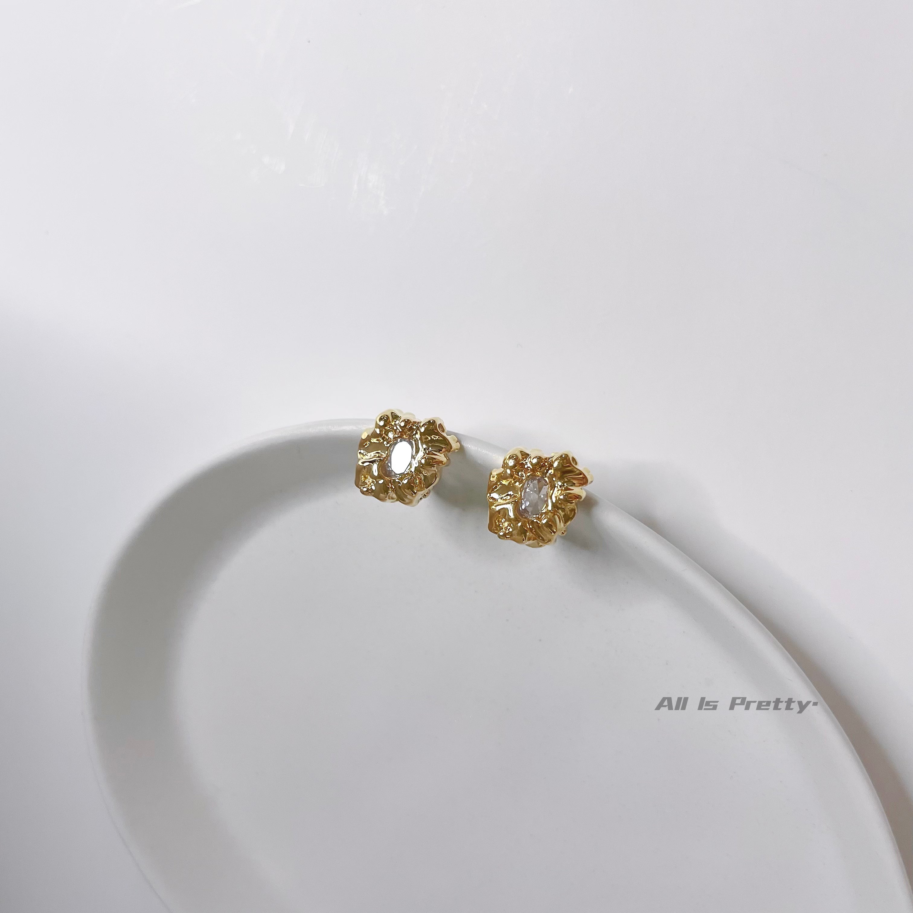 Gold stone studded earrings