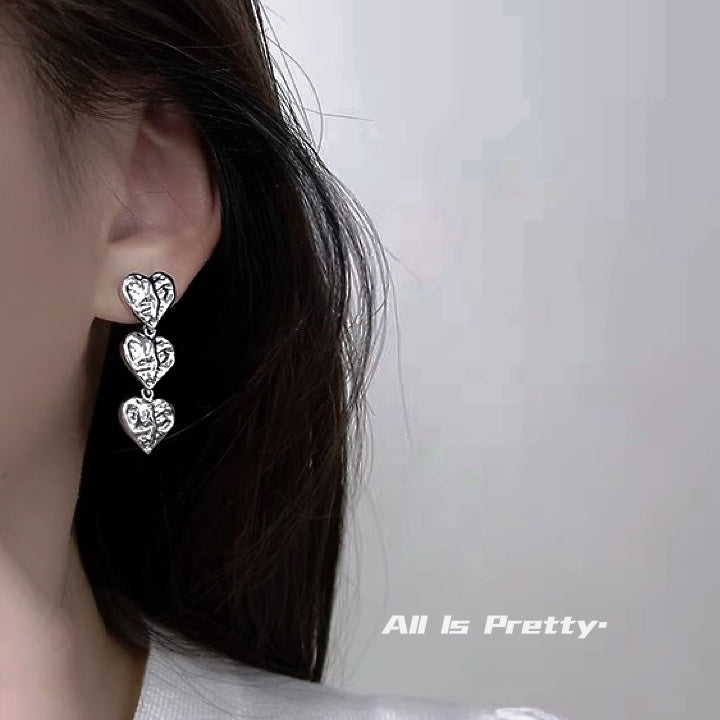 Textured hearts clip-on earrings