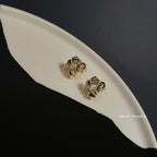 Gold stone studded earrings