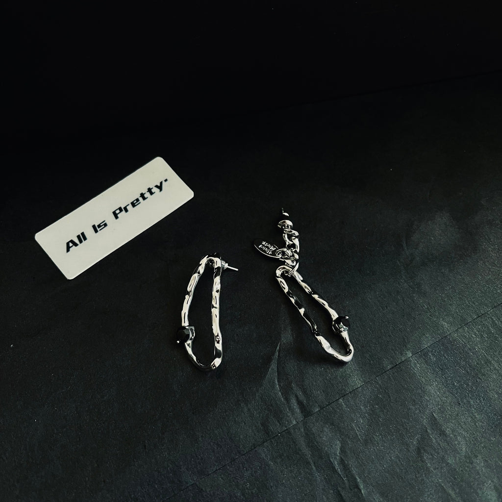 Unbalanced stylish earrings