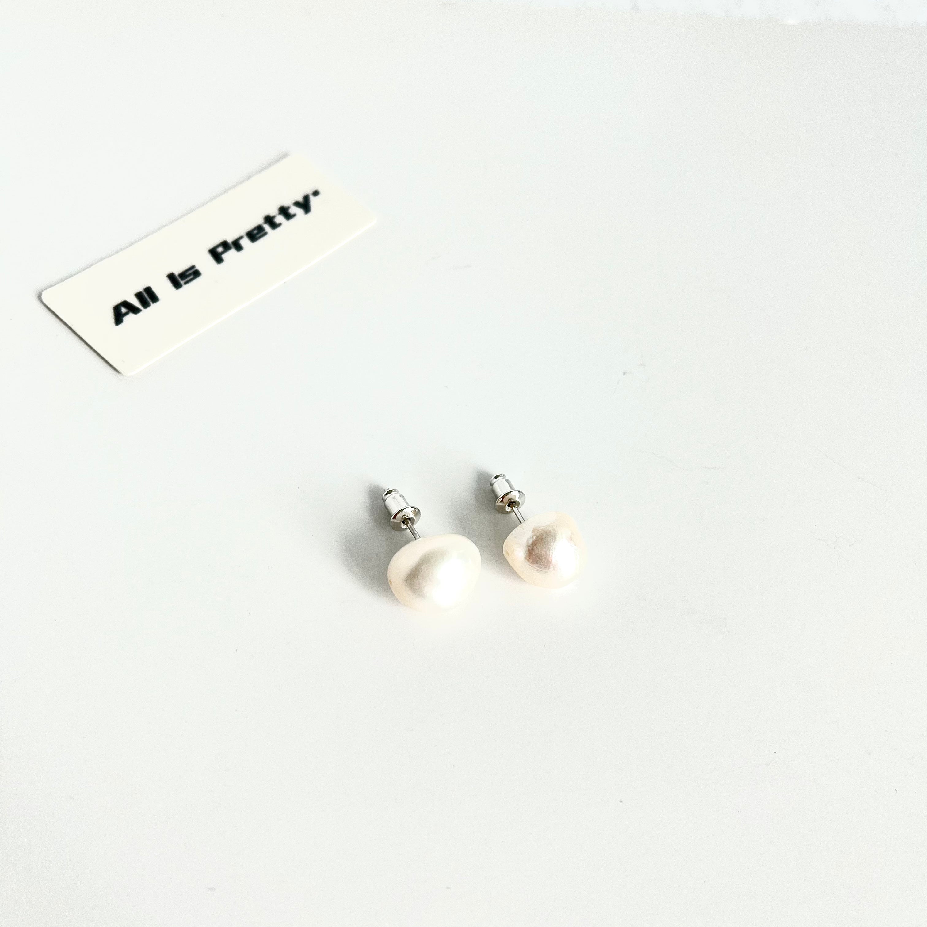 Baroque off round pearls studded earrings