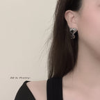 Heart black rose studded earrings