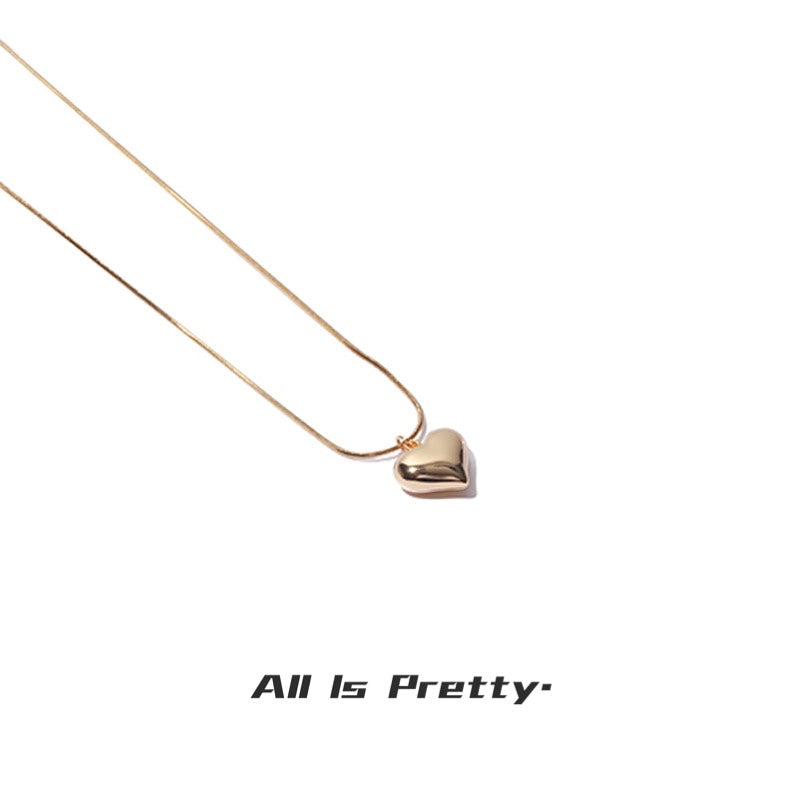 Yellow gold plated heart pendant necklace