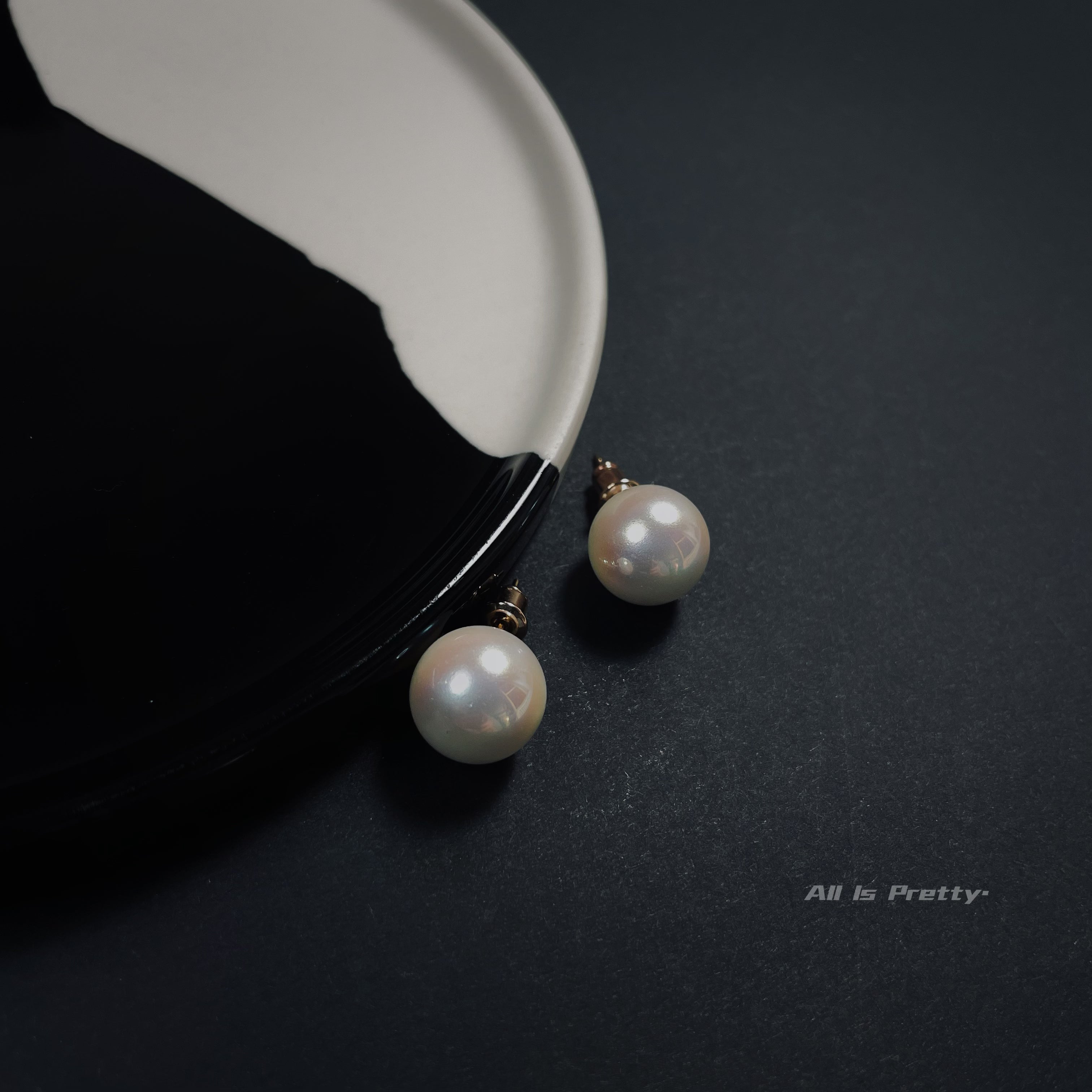 Glow Japanese faux pearl studded earrings