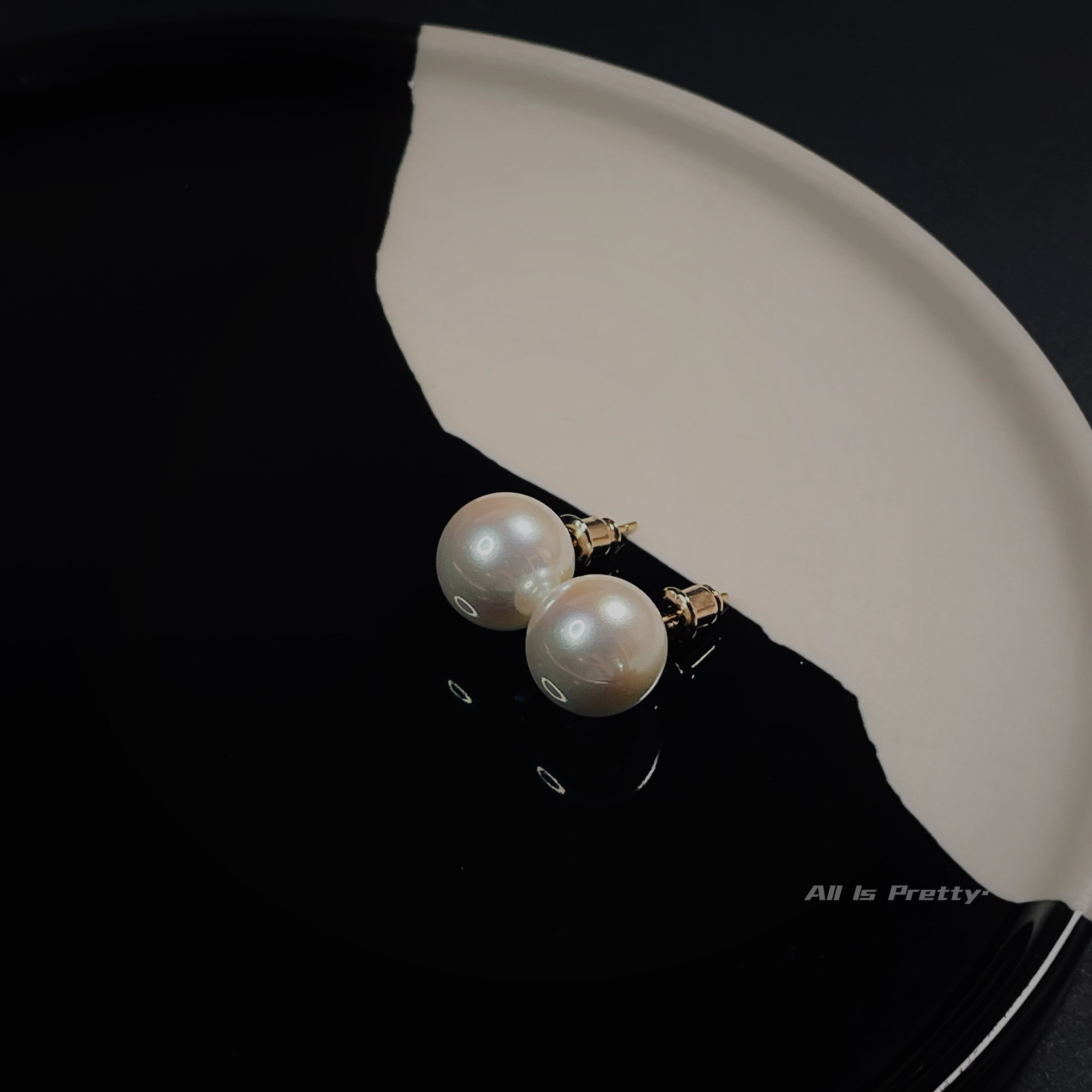 Glow Japanese faux pearl studded earrings