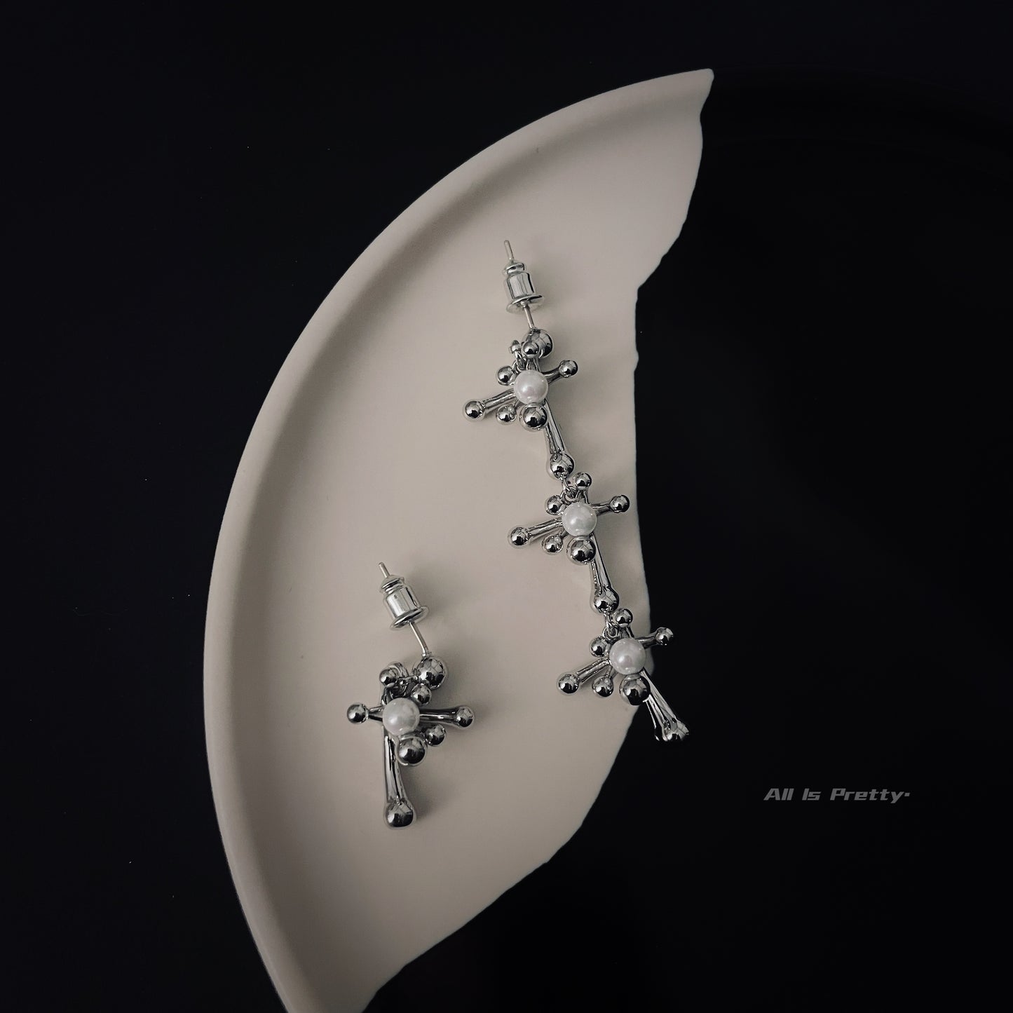 Snowflake unbalanced earrings