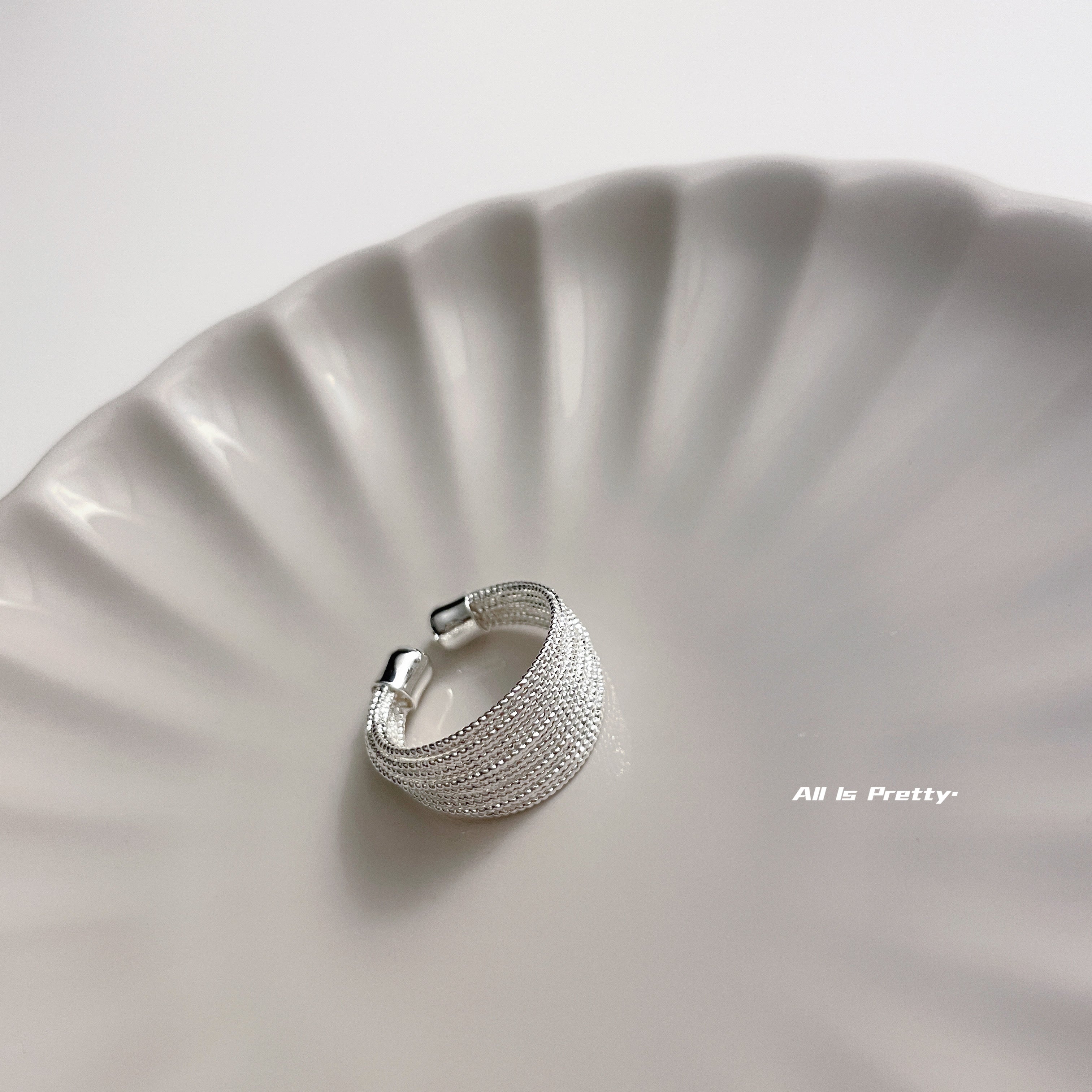 Layered open ring