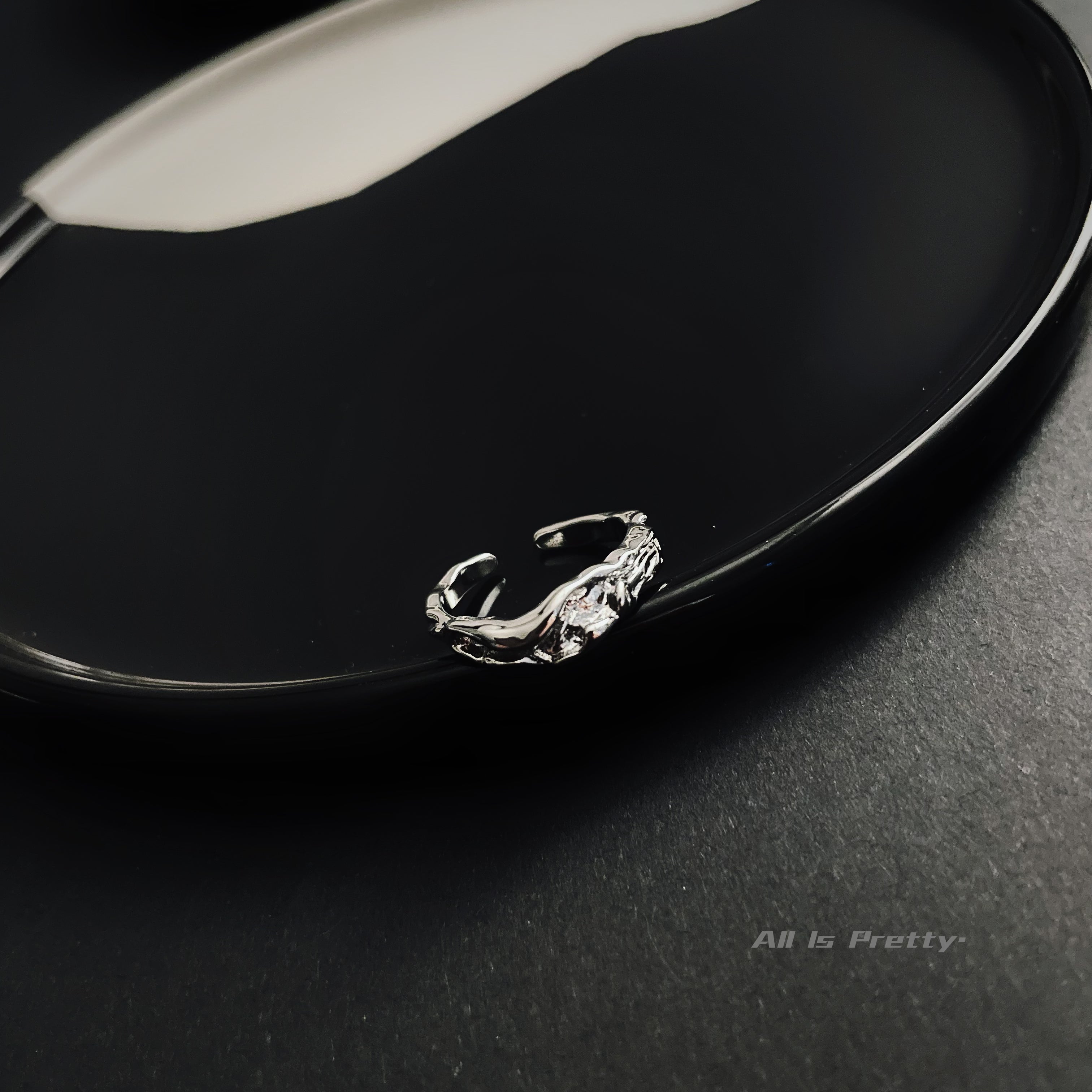 Textured open ring