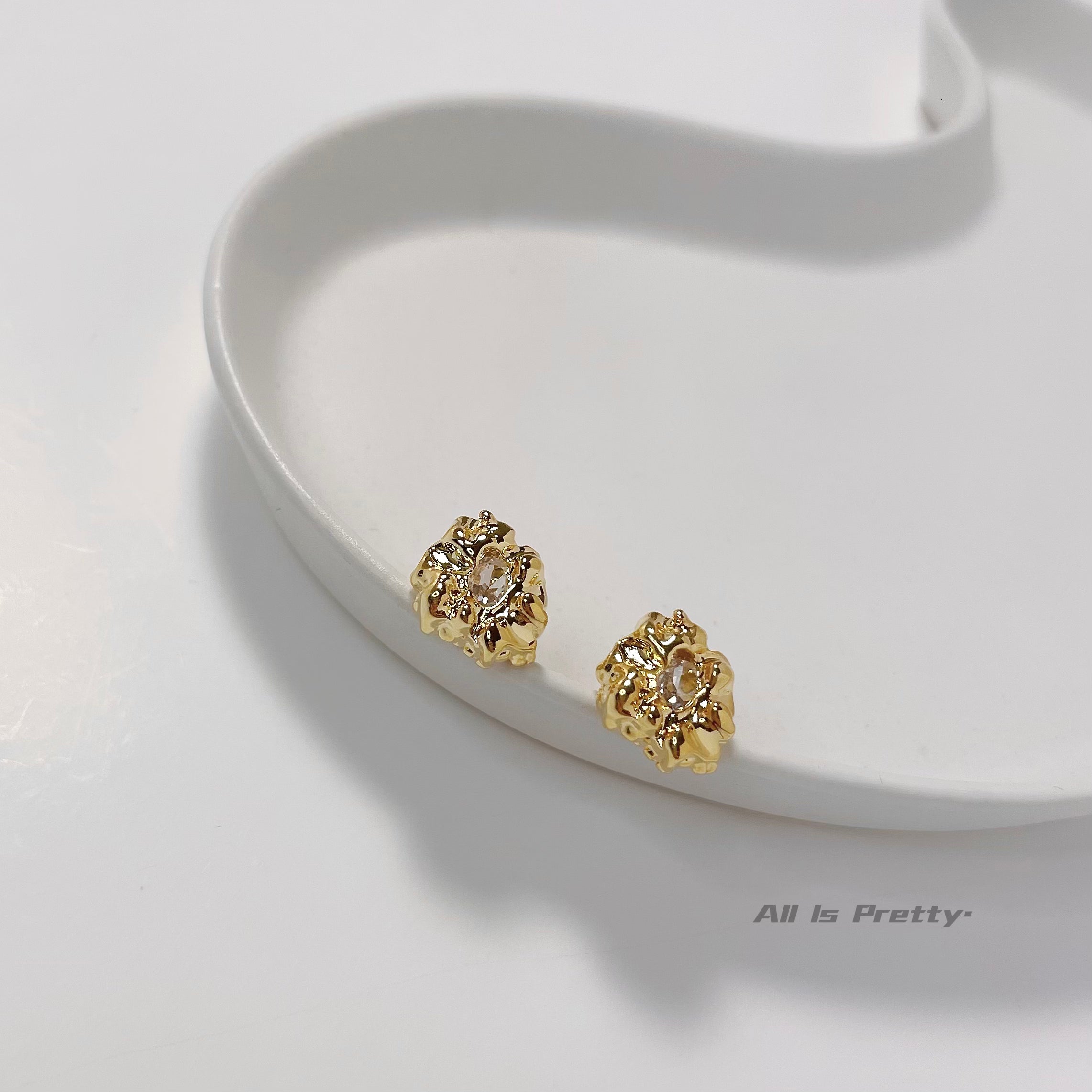 Gold stone studded earrings