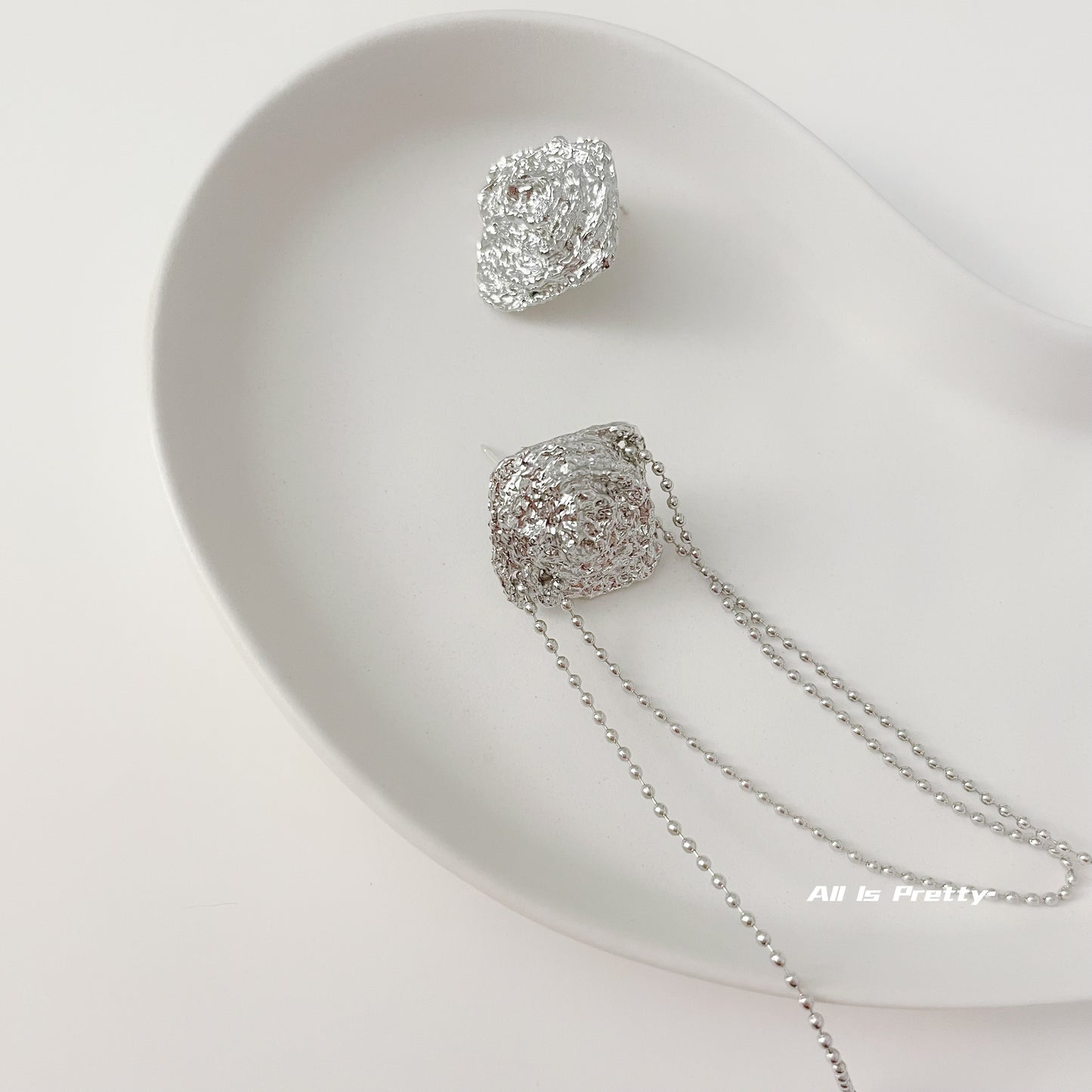 Unbalanced textured rose earrings