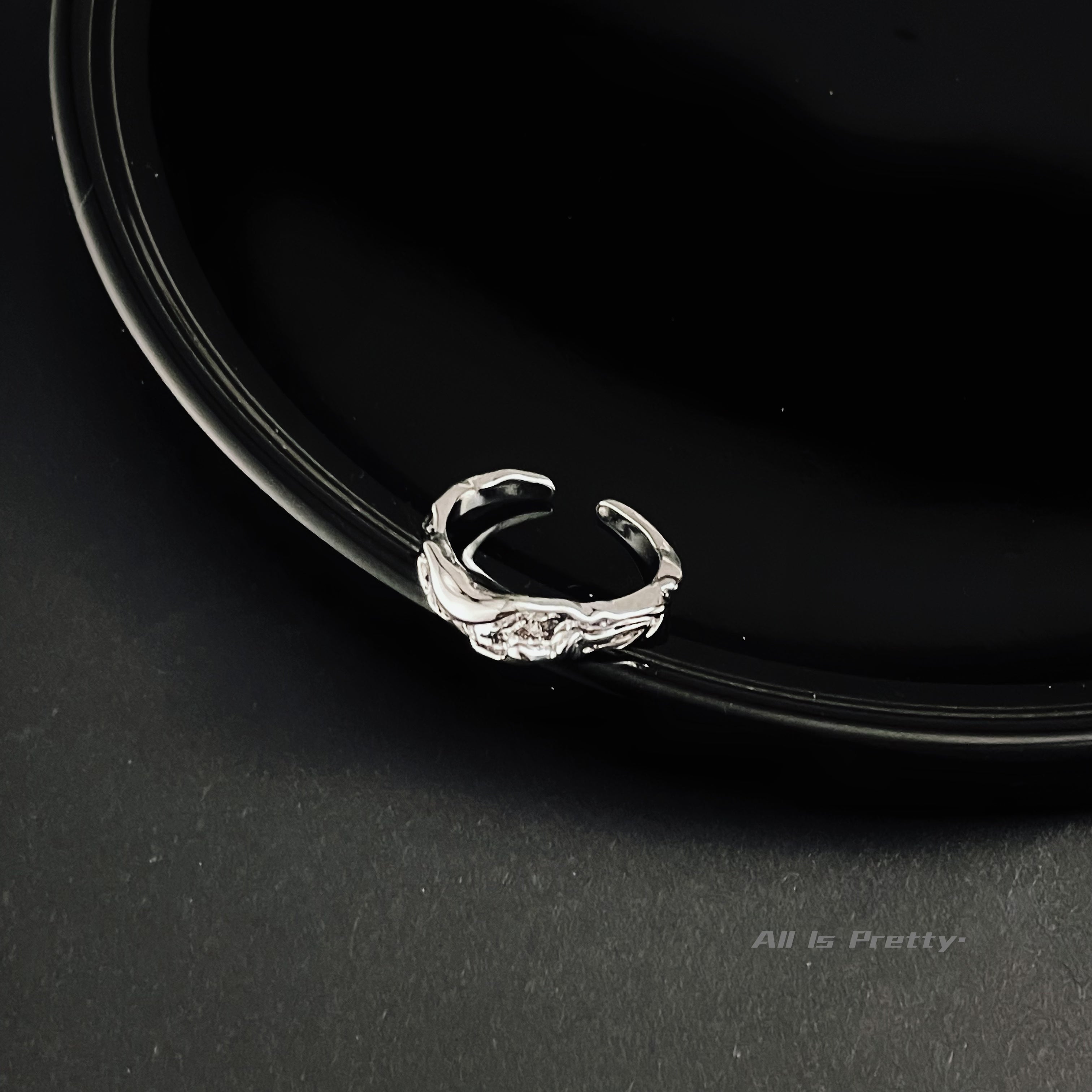 Textured open ring
