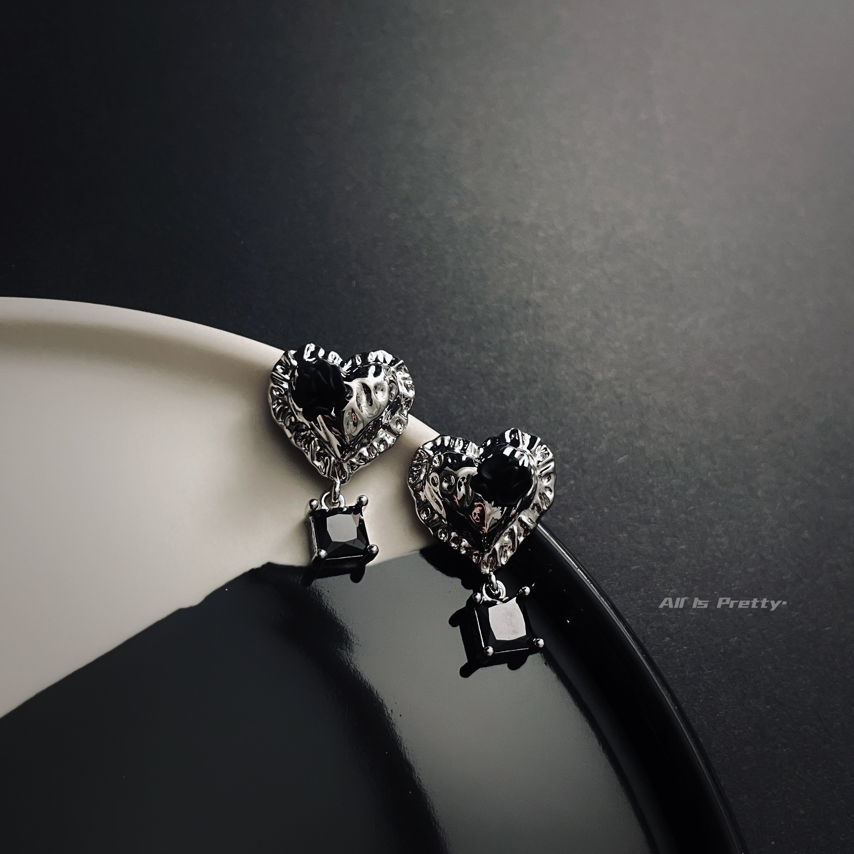 Heart black rose studded earrings