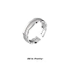 Wave sterling silver band ring
