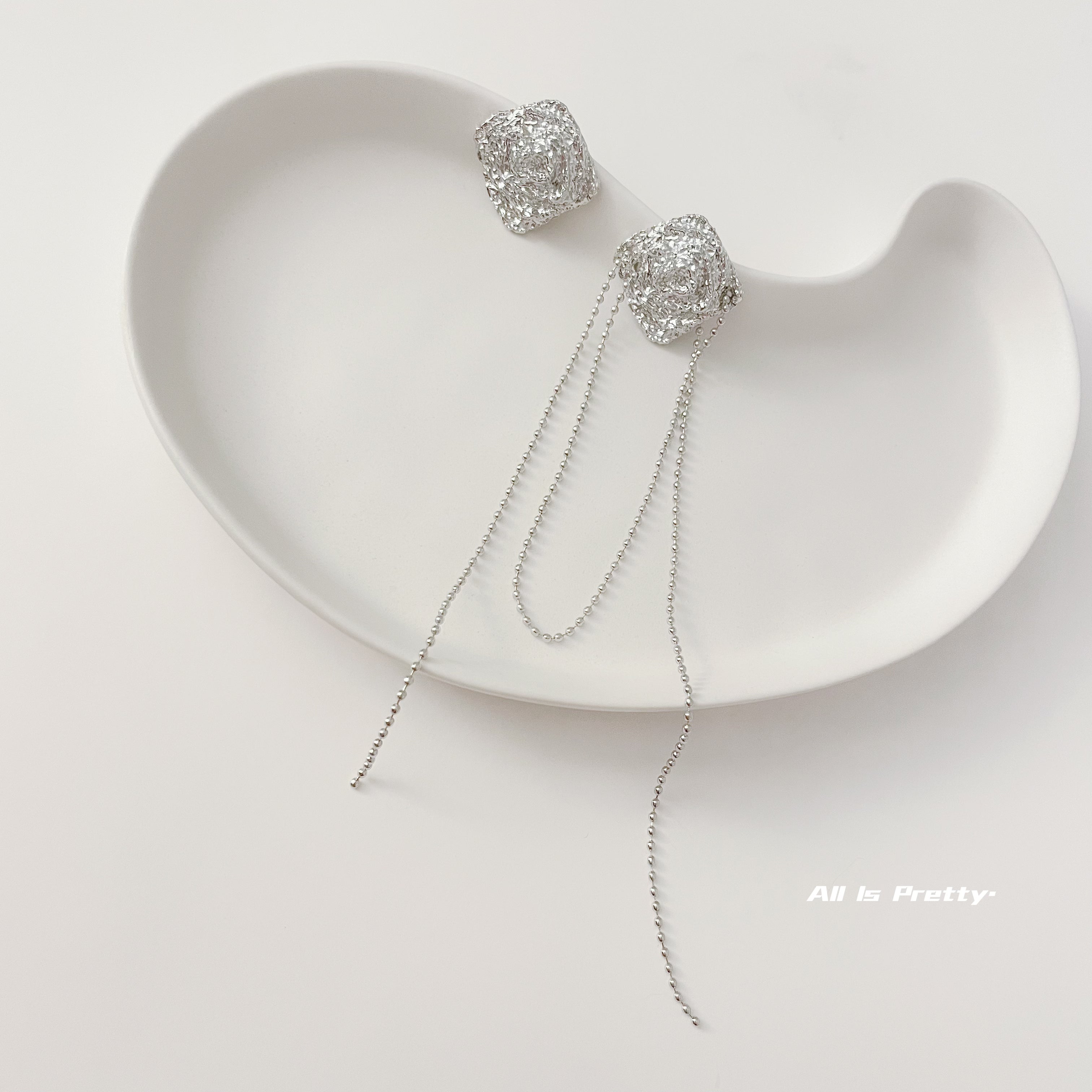 Unbalanced textured rose earrings
