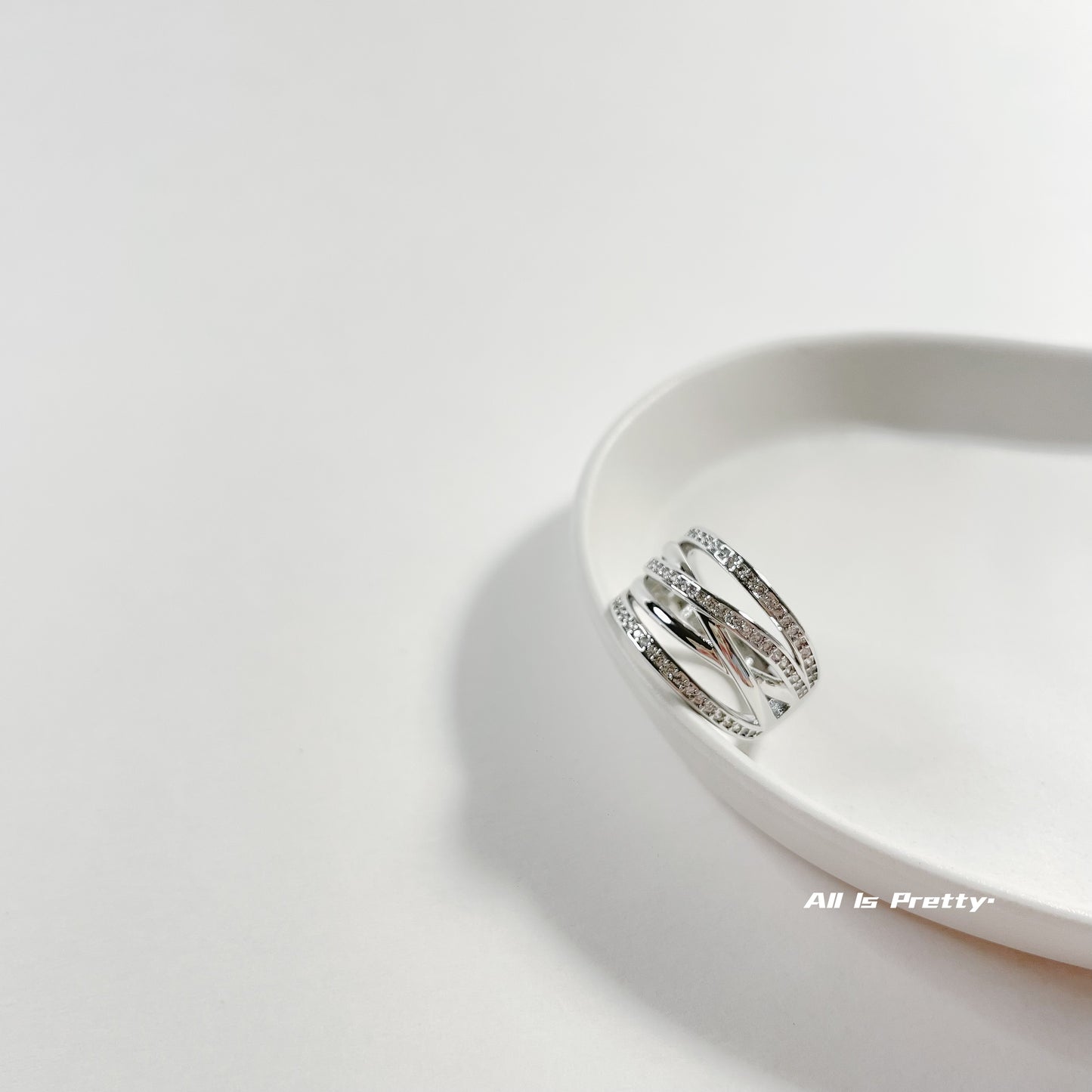 Layered crystal ring