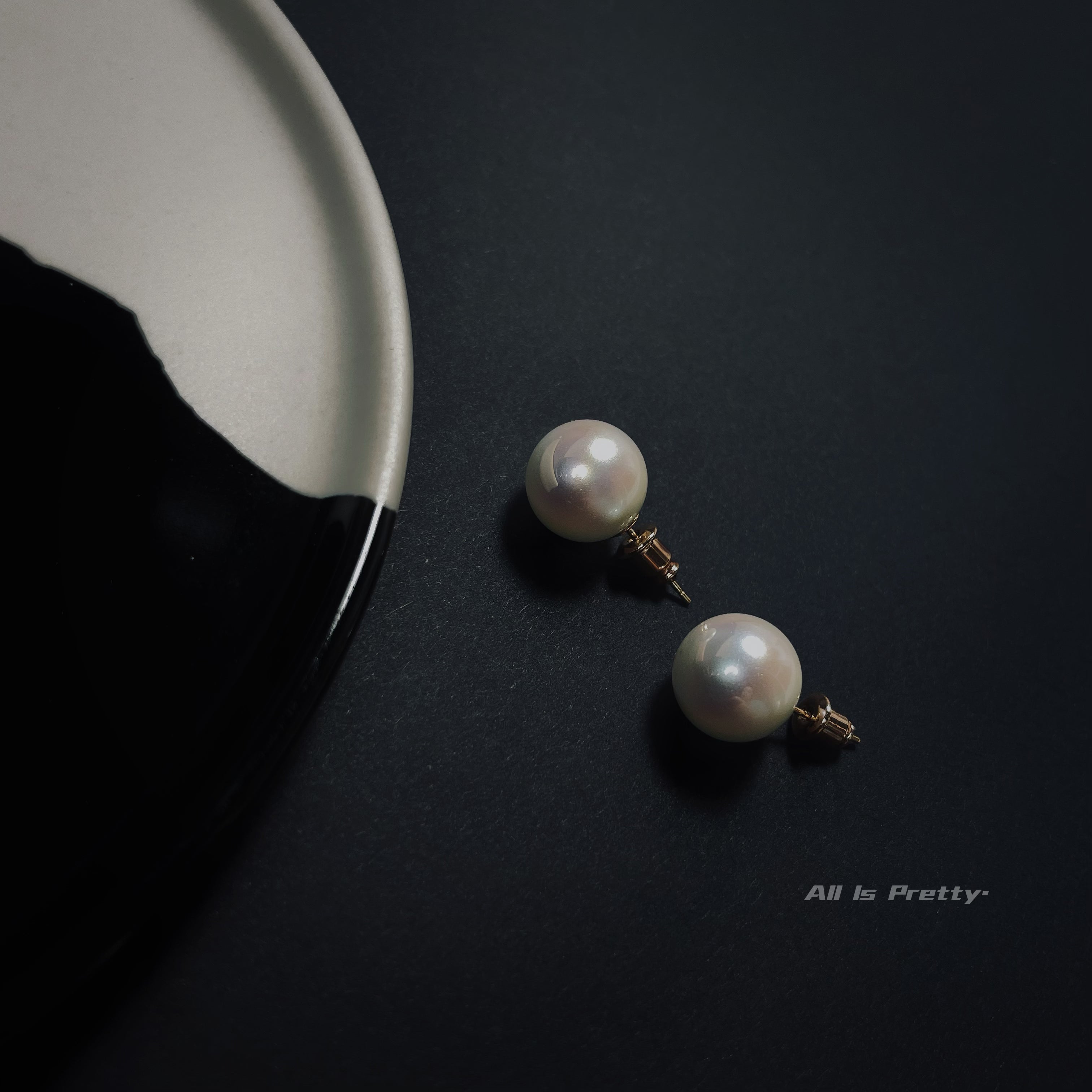 Glow Japanese faux pearl studded earrings