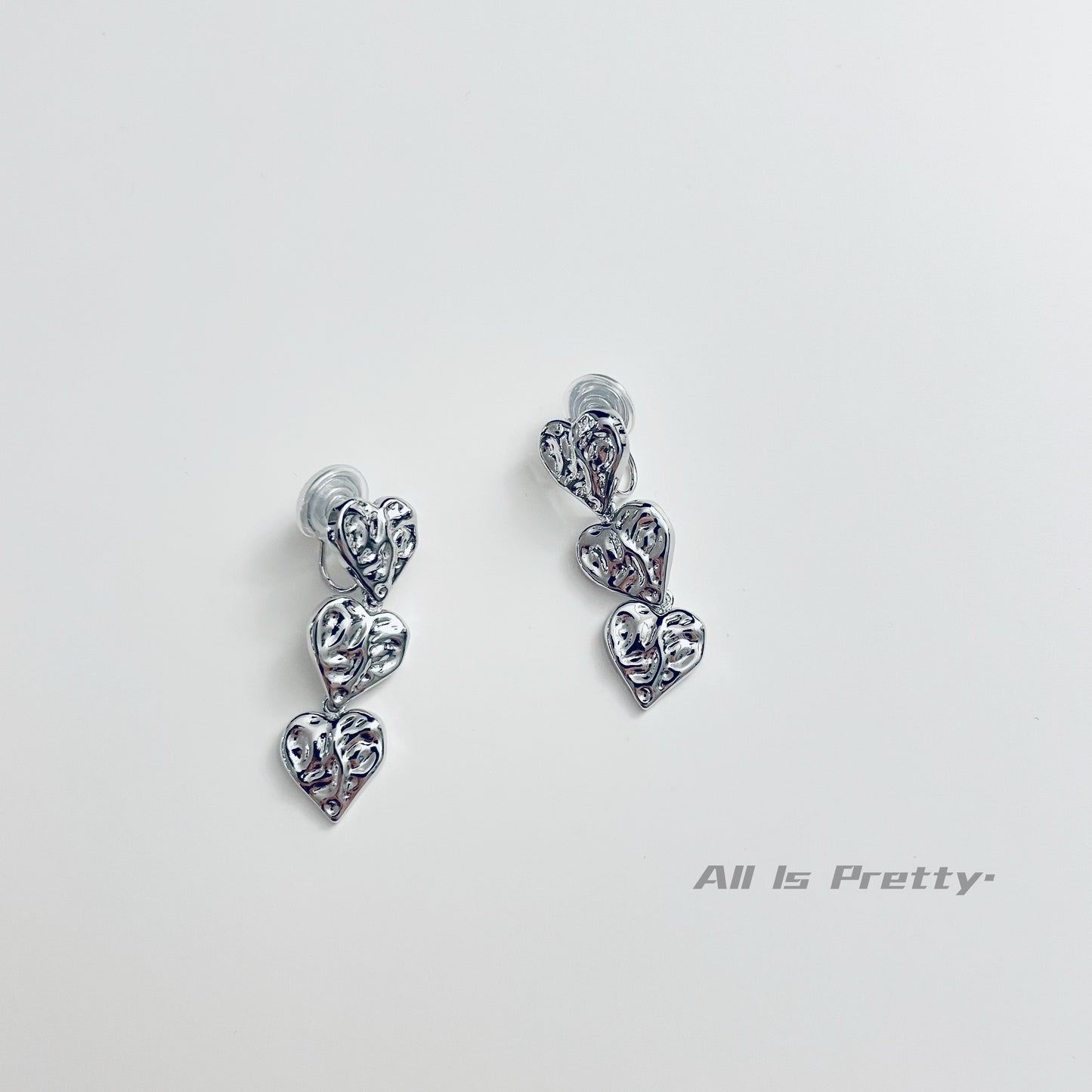 Textured hearts clip-on earrings