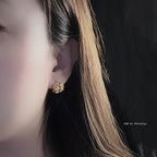 Gold stone studded earrings