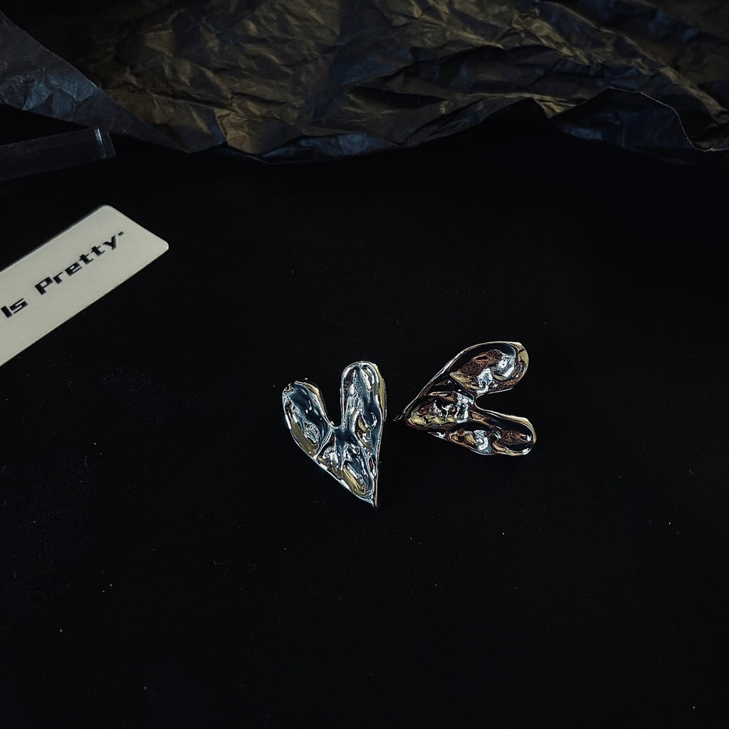 Rough heart shape studded earrings