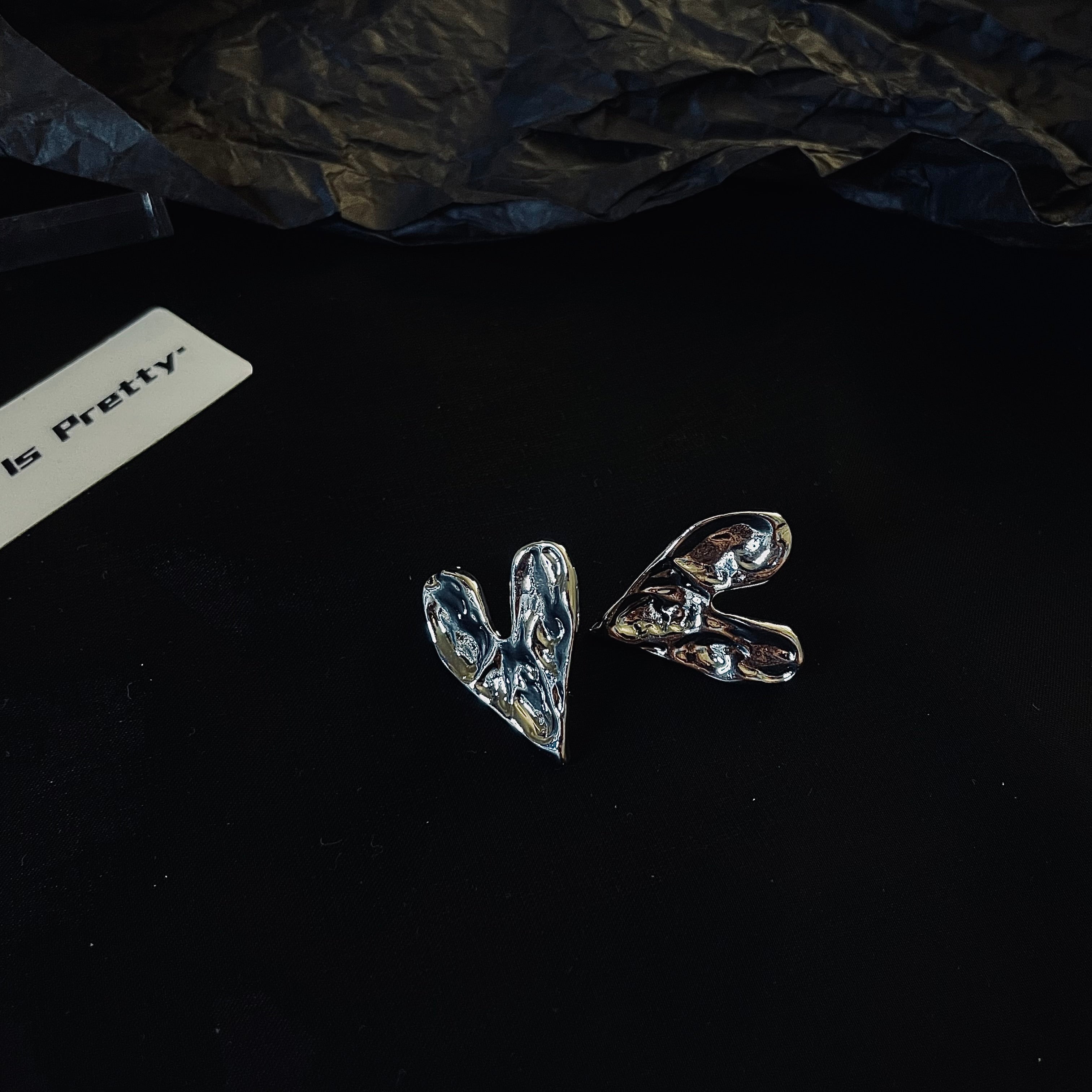 Rough heart shape studded earrings