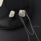 Unbalanced textured rose earrings
