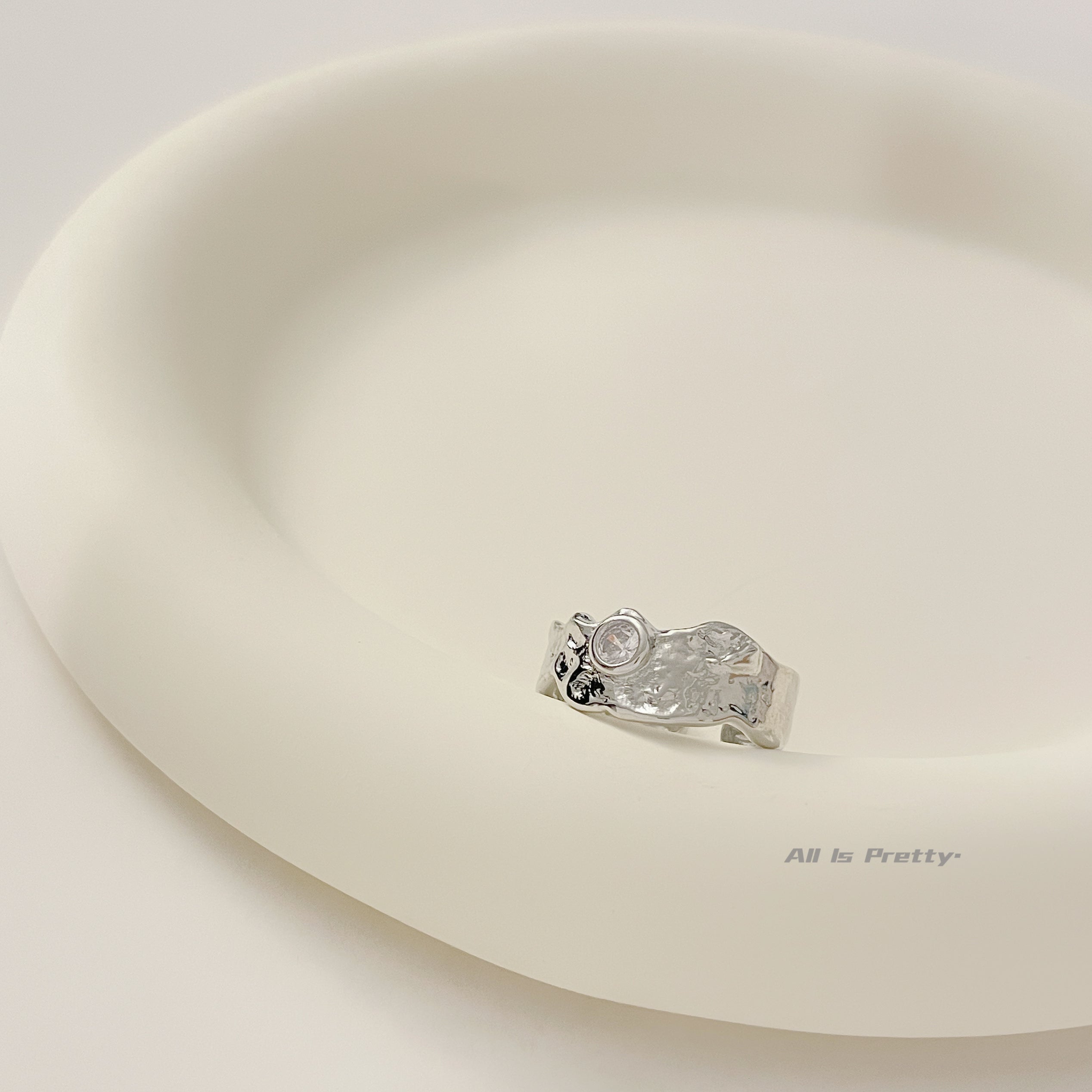 Textured open ring