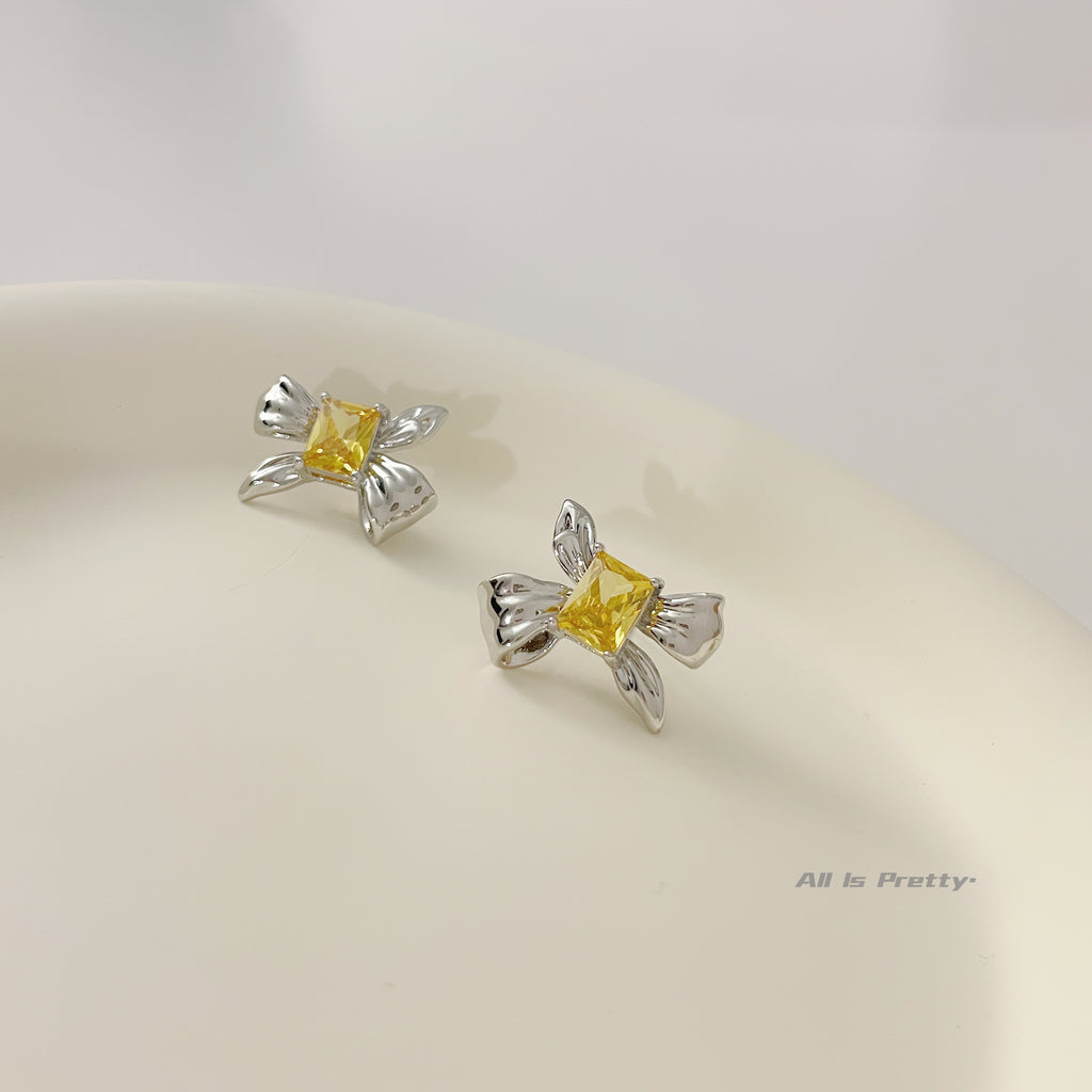 Yellow crystal bow stud earrings