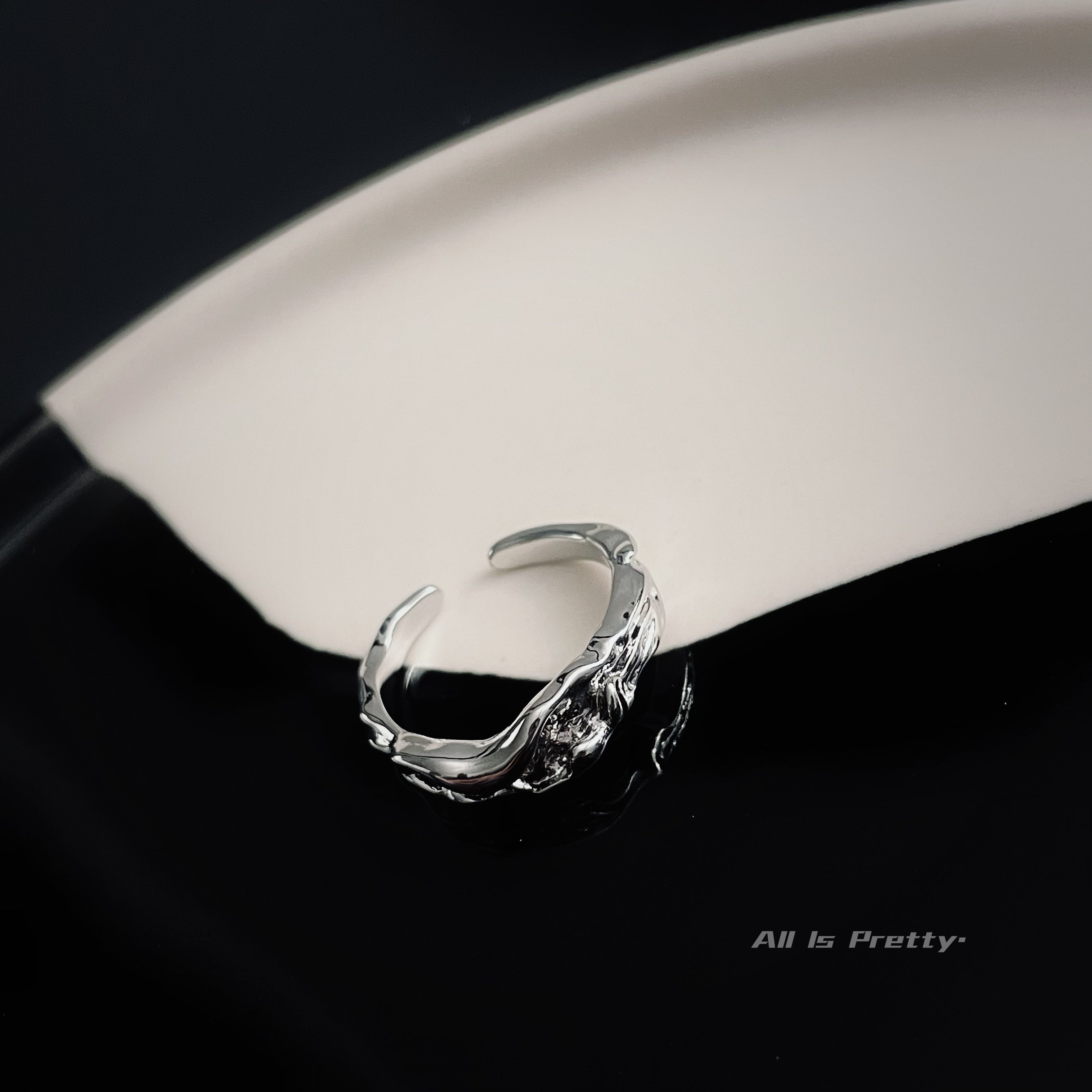Textured open ring