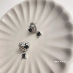 Heart black rose studded earrings