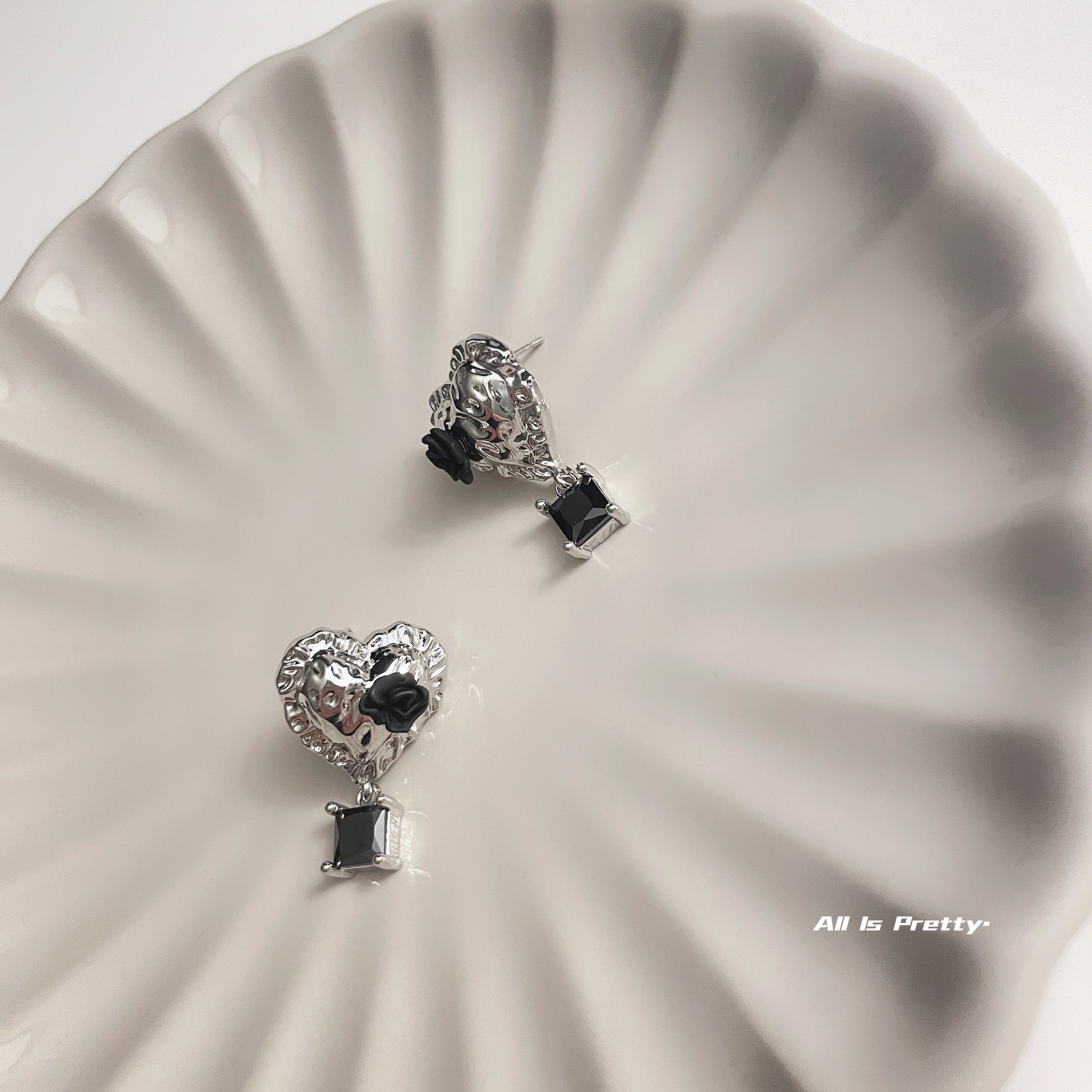 Heart black rose studded earrings