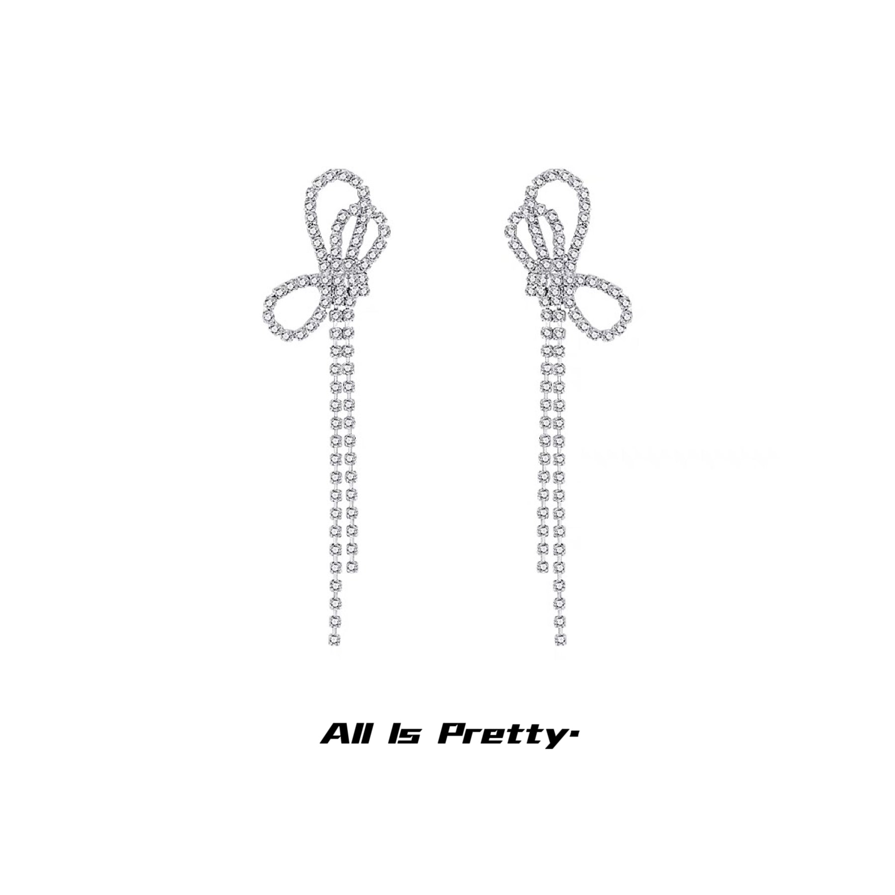 Crystal bow tassel clip earrings