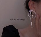 Large pearl bow earrings