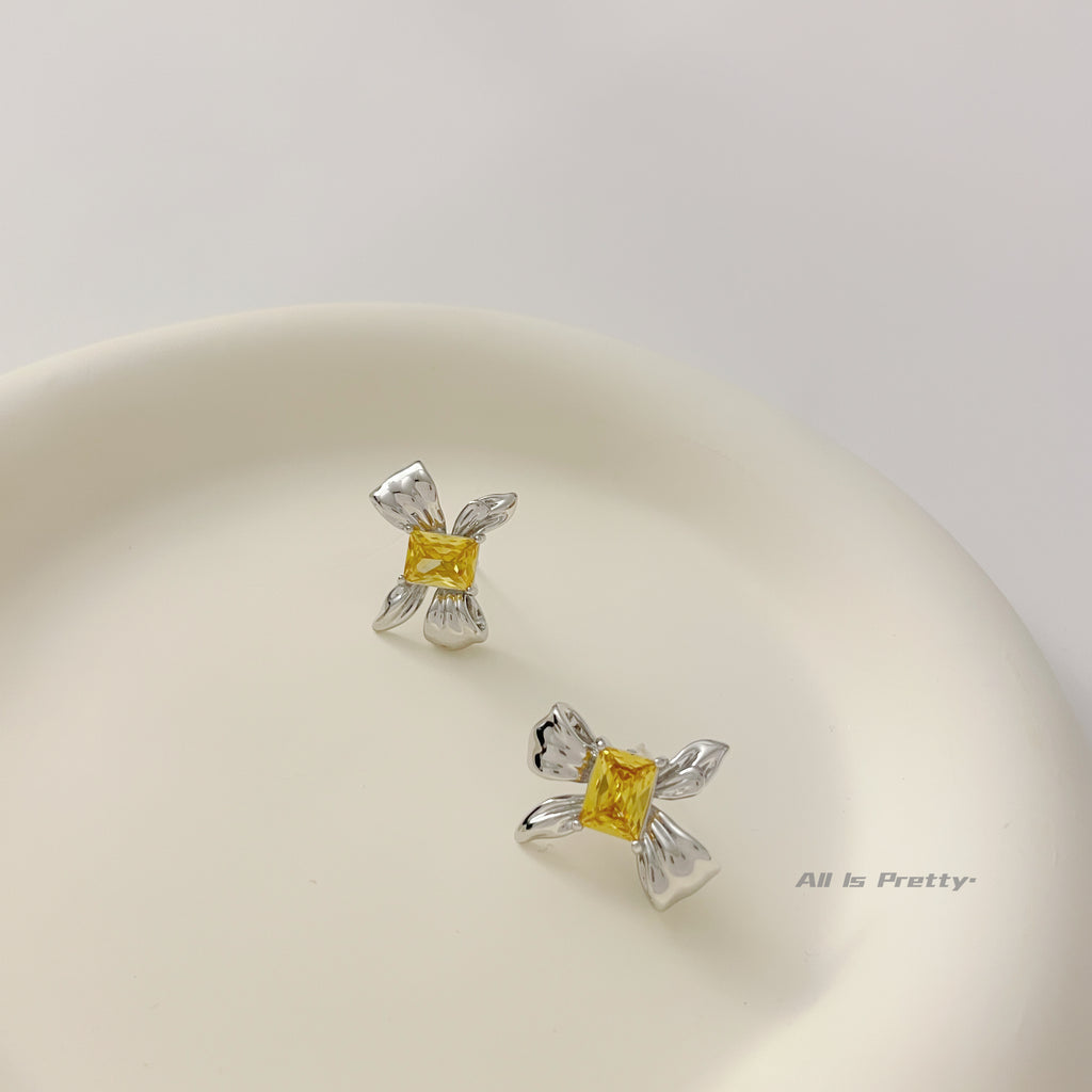 Yellow crystal bow stud earrings